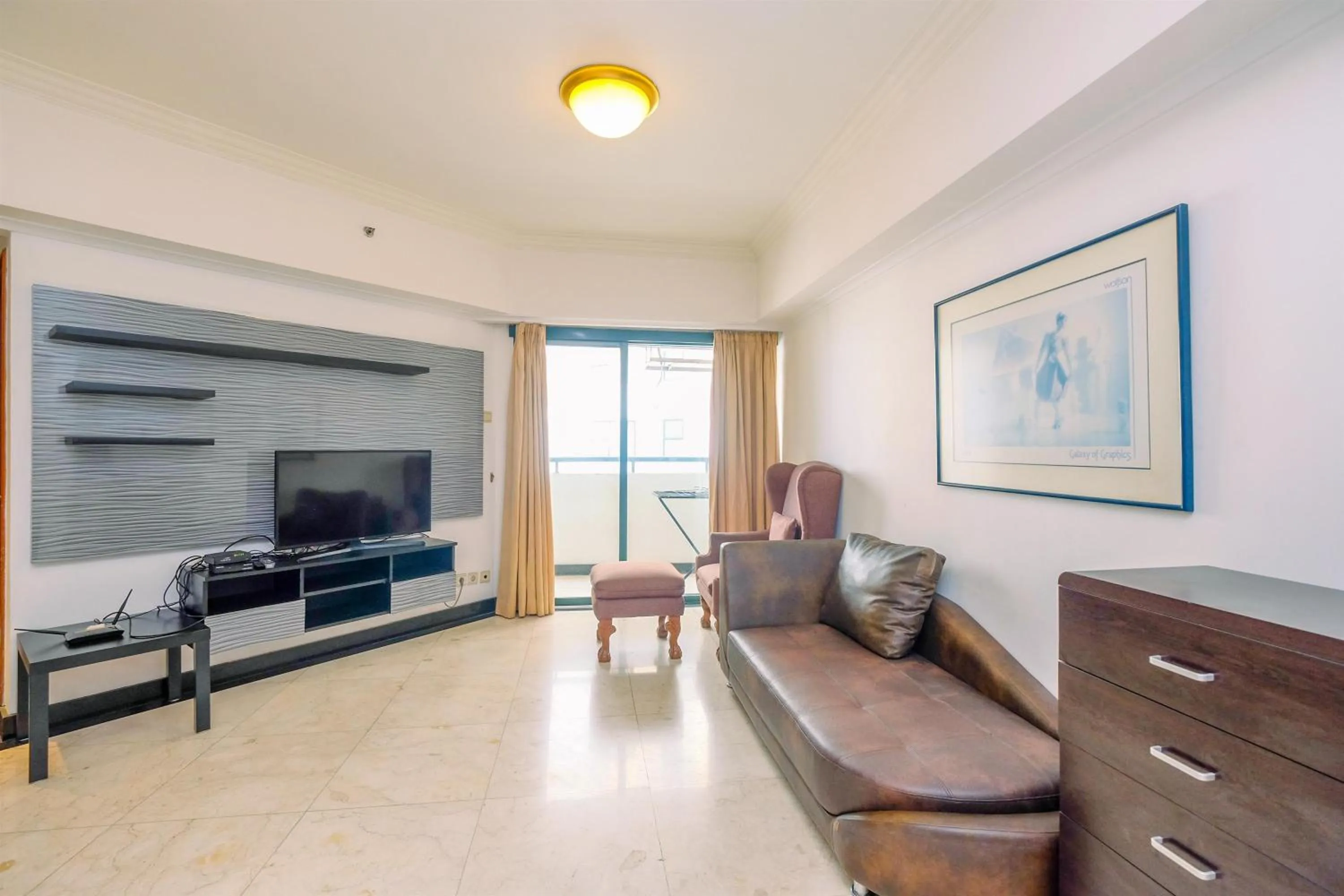 Comfort 2BR + Extra Room at Sudirman Tower Condominium Apartment By Travelio