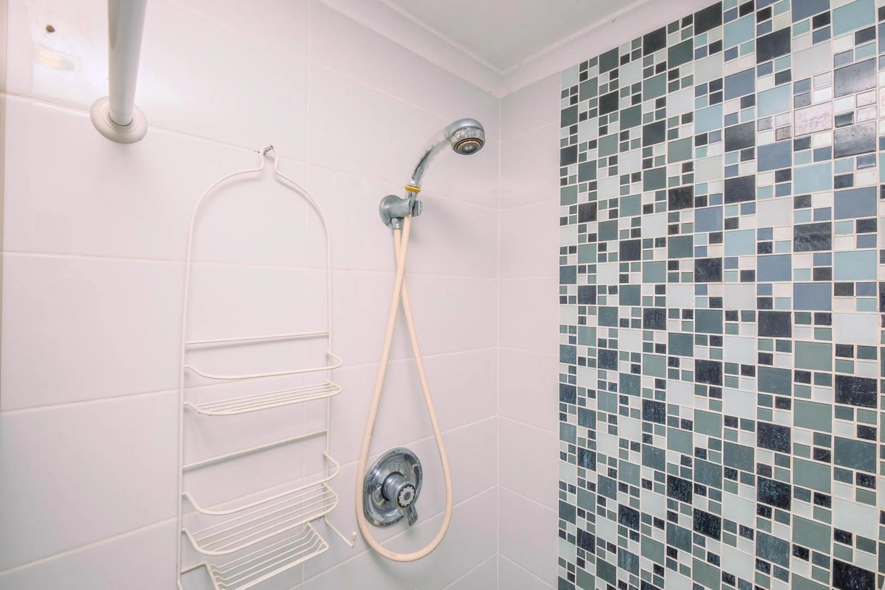 Bathroom in Comfort 2BR + Extra Room at Sudirman Tower Condominium Apartment By Travelio