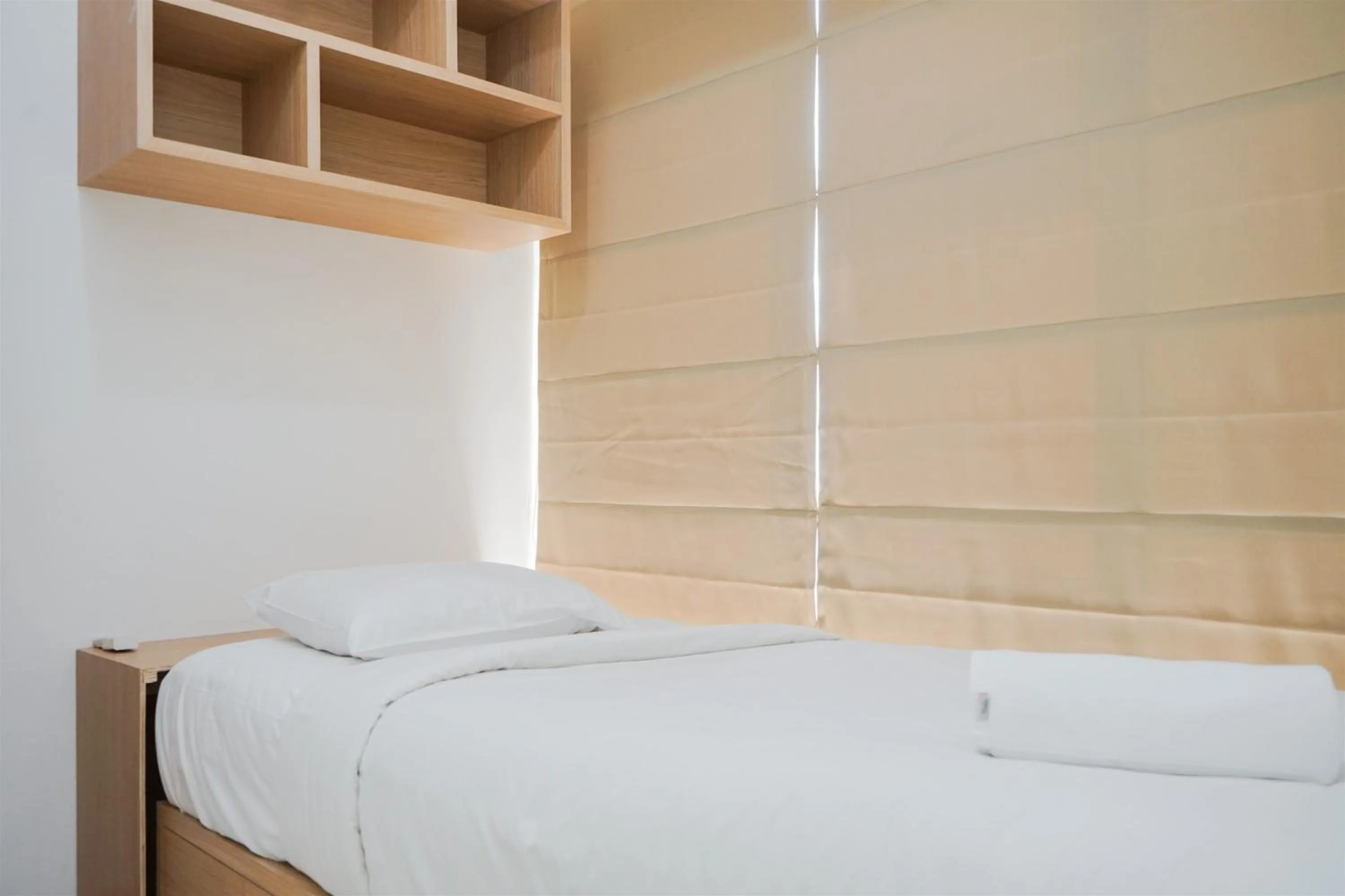 Two-Bedroom Apartment in Nice and Comfy 2BR Apartment at M-Town Residence near Summarecon By Travelio