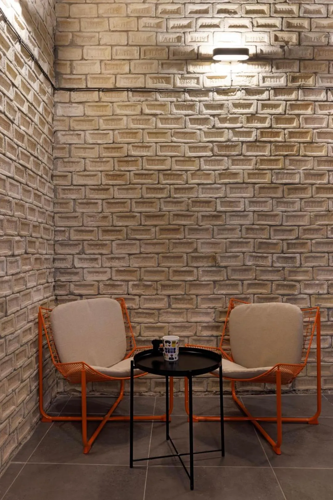 Seating area in Retroverse Eccentric Stay