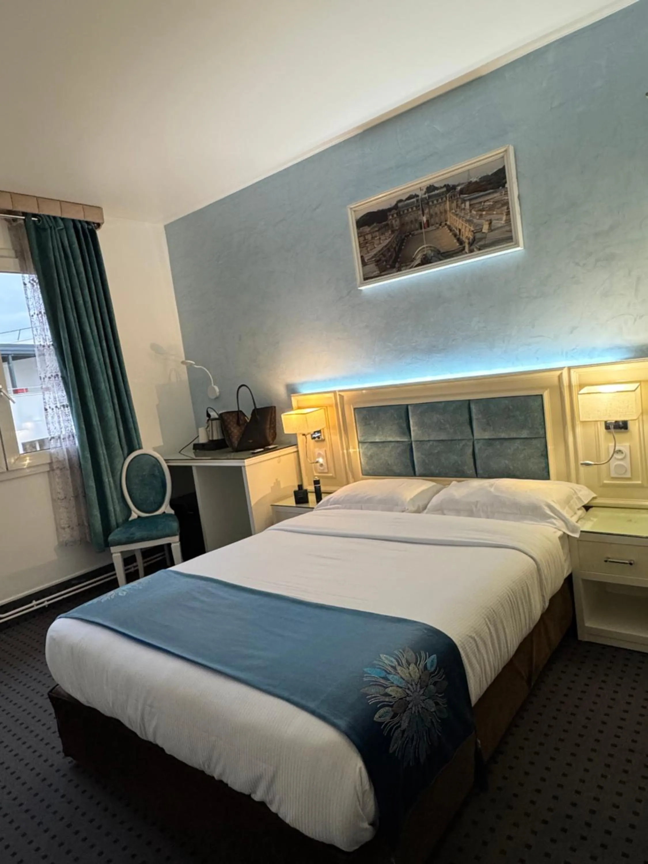 Bed in Hotel Grand Paris