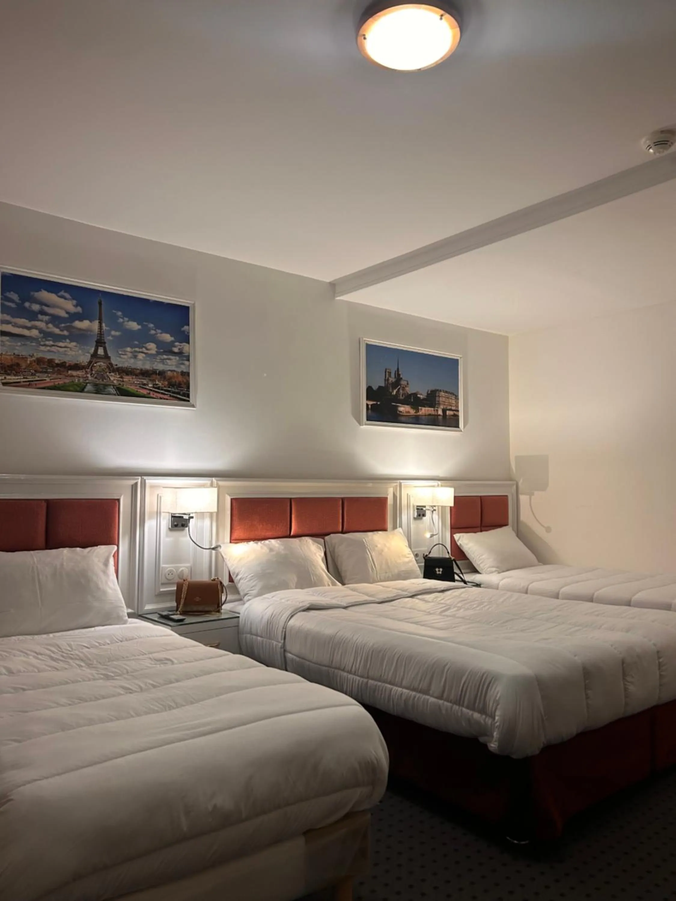 Bed in Hotel Grand Paris