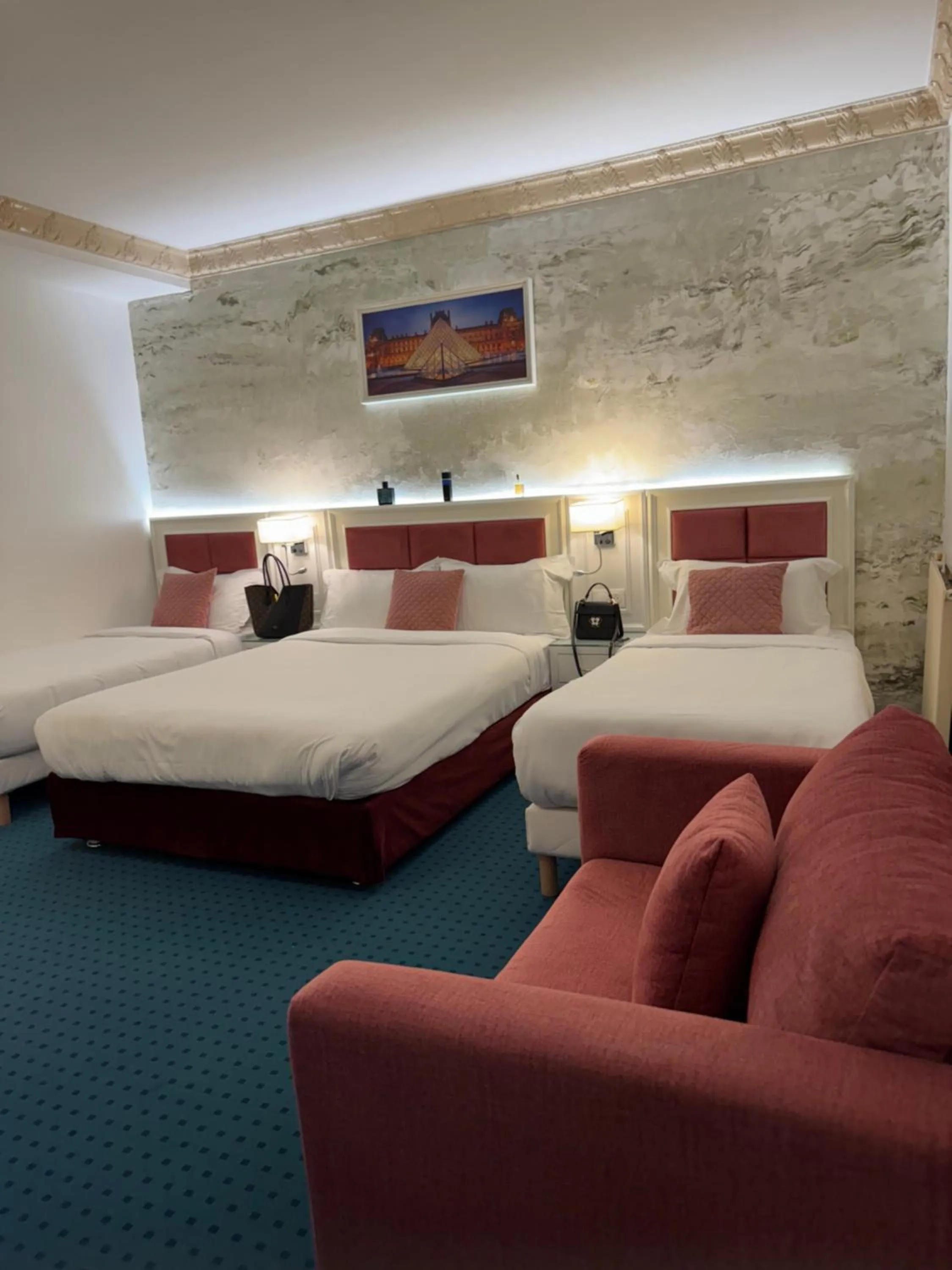 Bed in Hotel Grand Paris