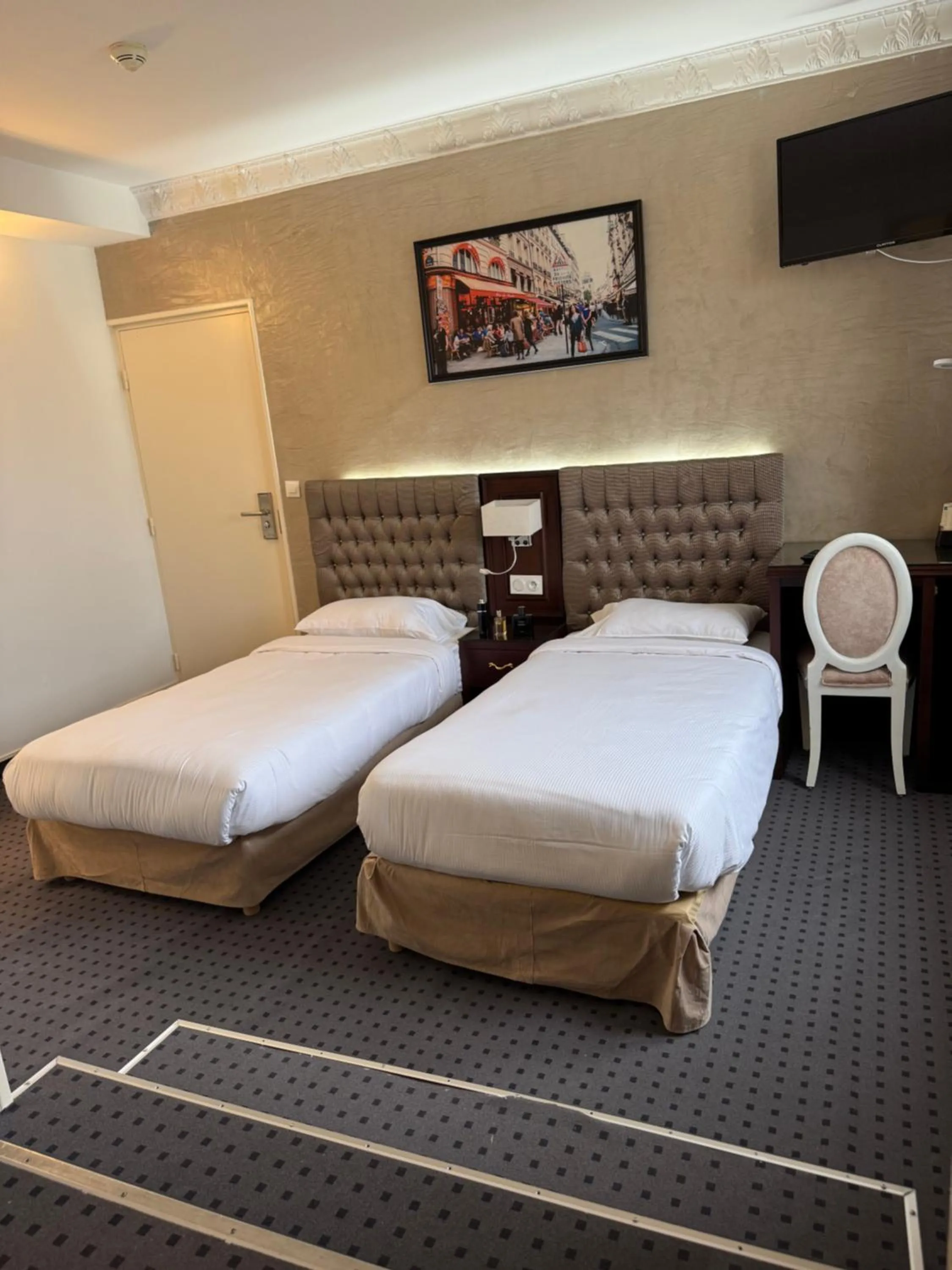 Bed in Hotel Grand Paris