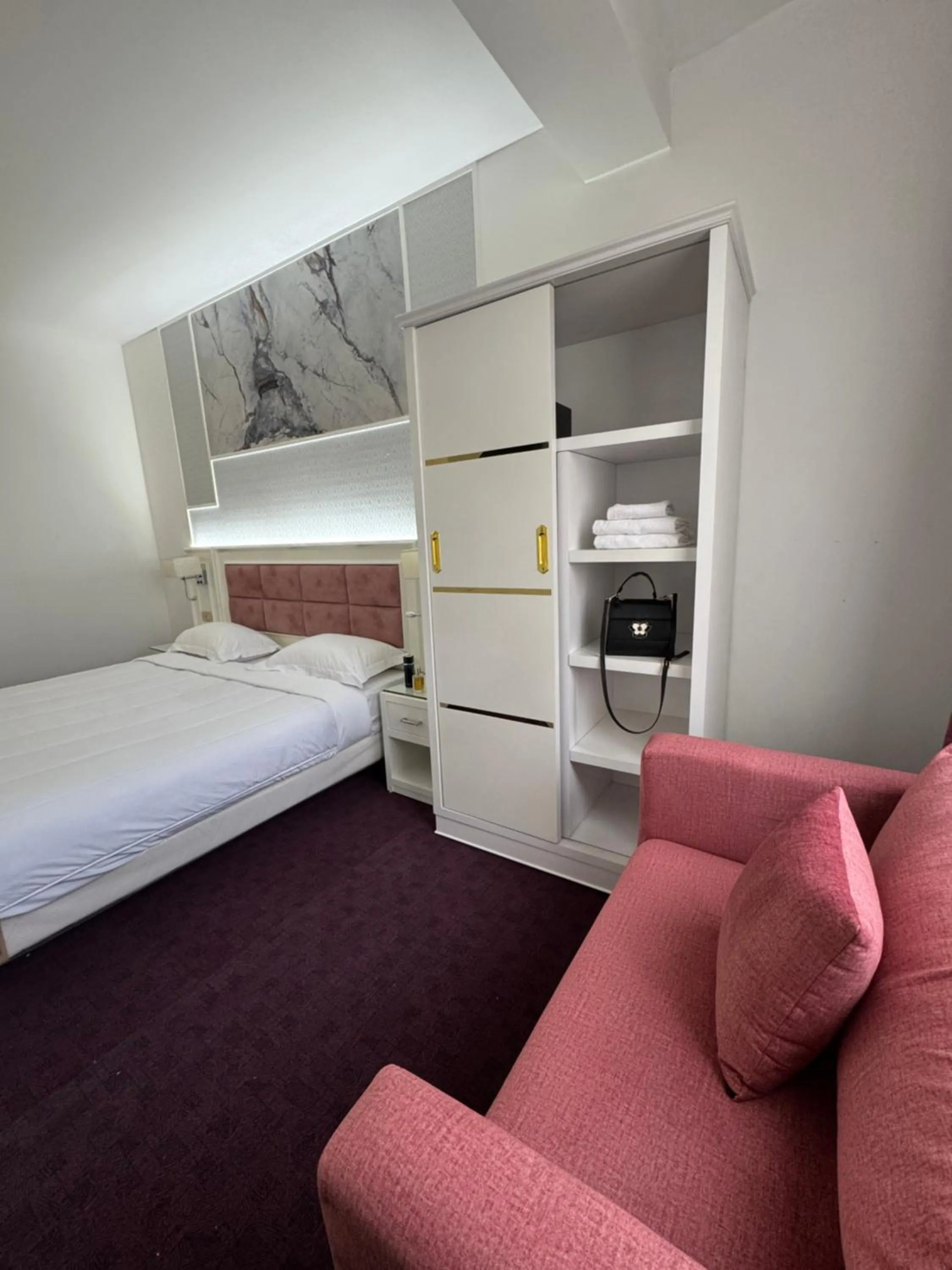 Bed in Hotel Grand Paris