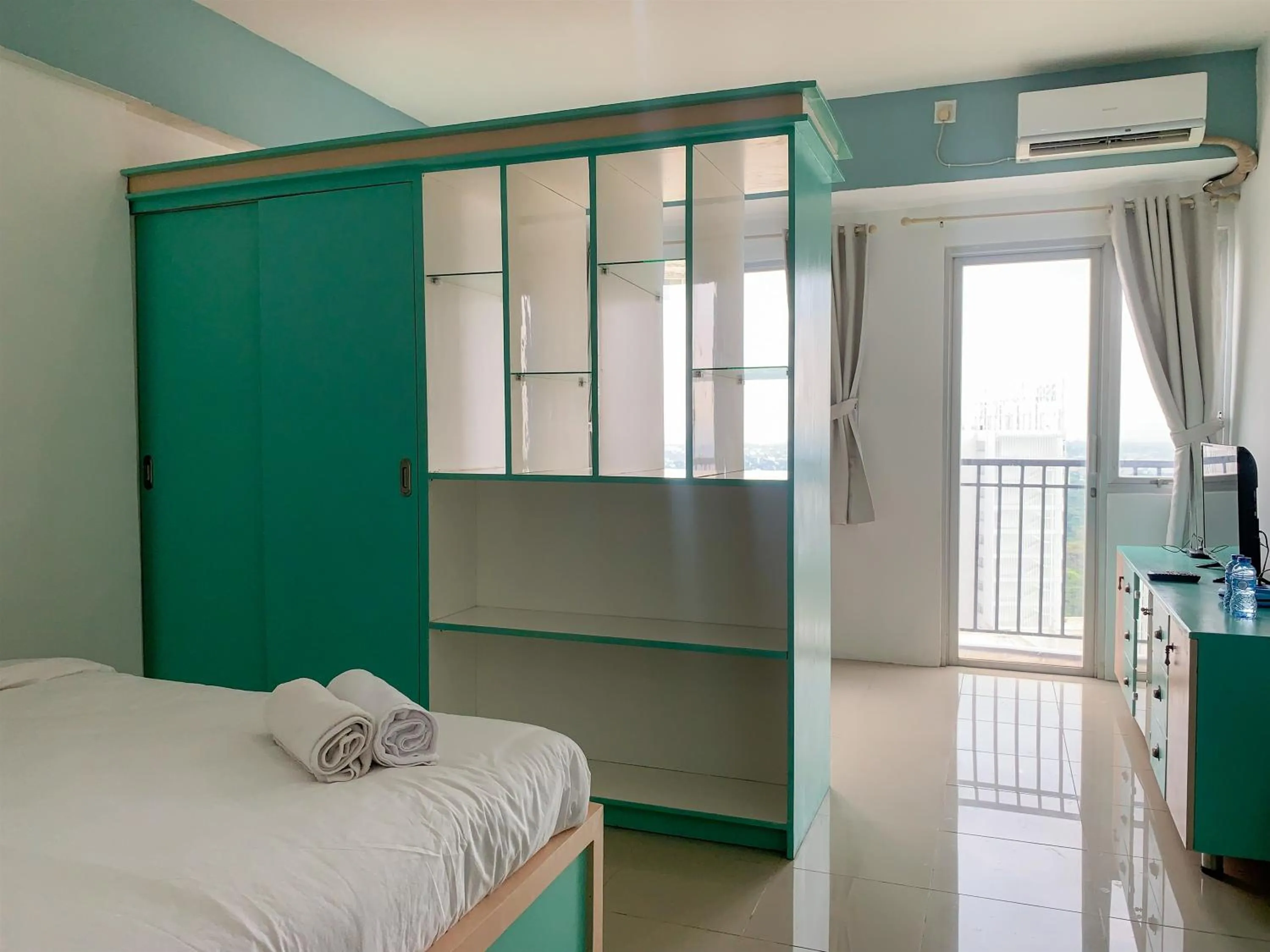 Bed in Cozy Studio at Park View Condominium Apartment By Travelio