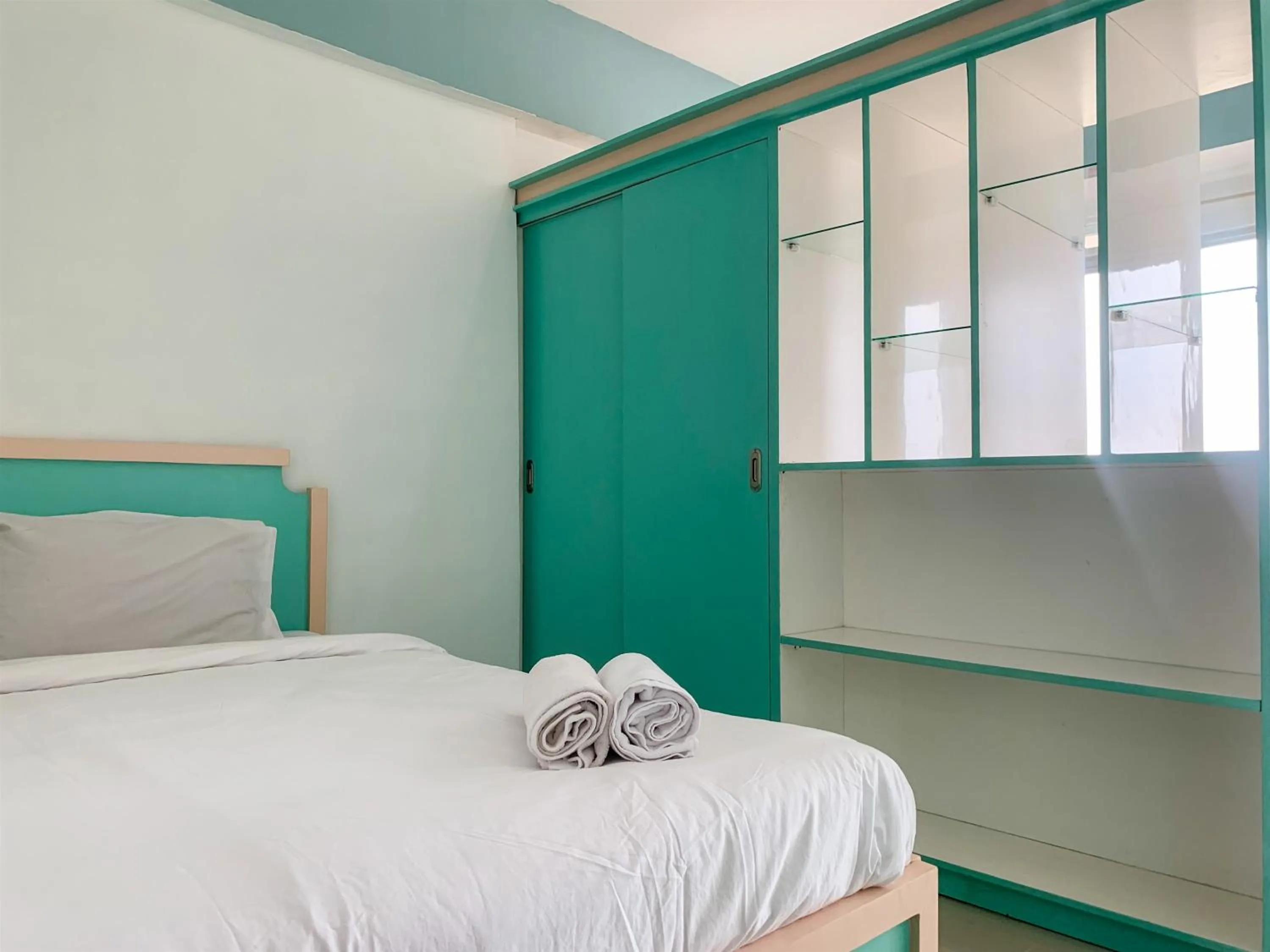 Bed in Cozy Studio at Park View Condominium Apartment By Travelio