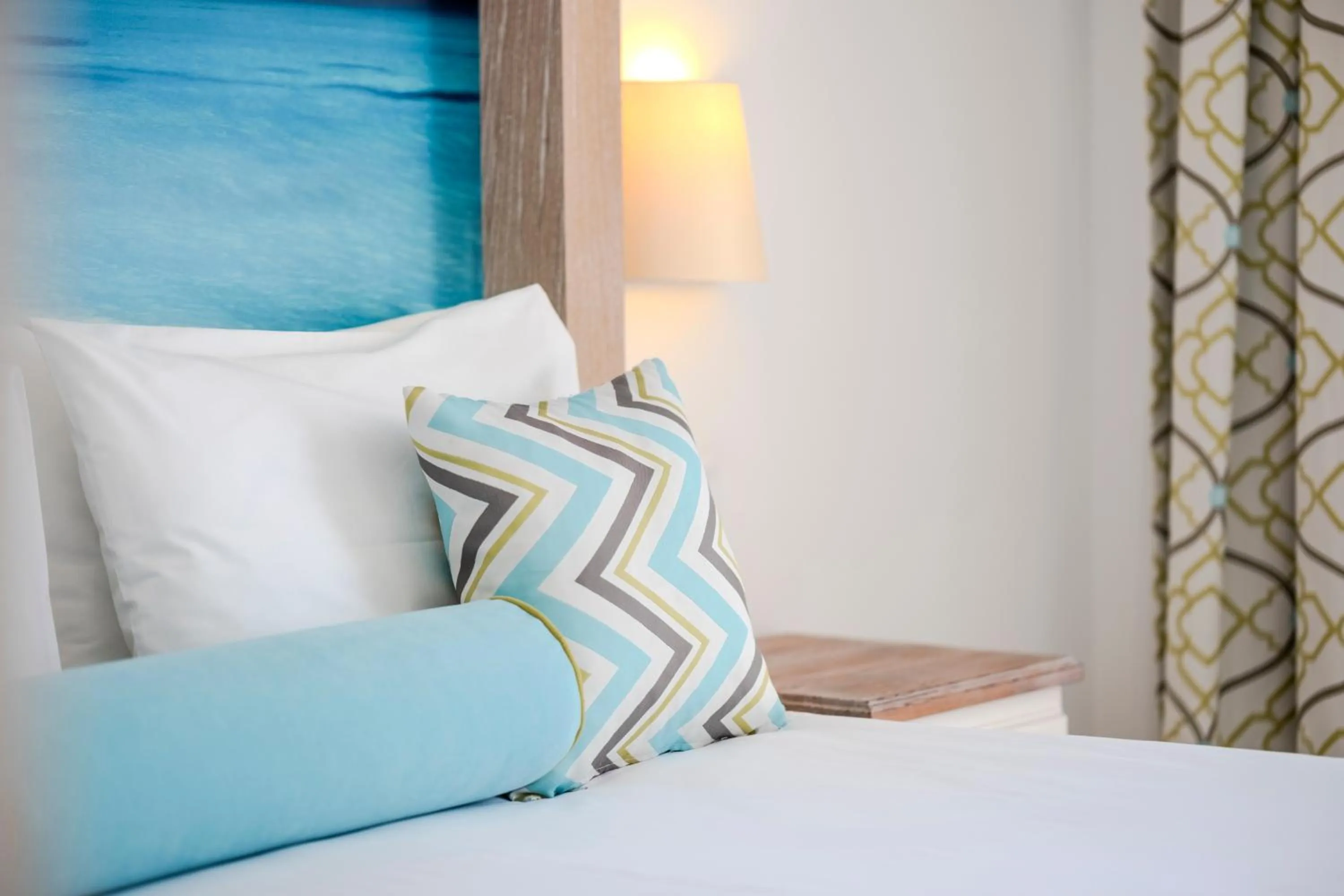 Bed in Iz Flower Side Beach Hotel