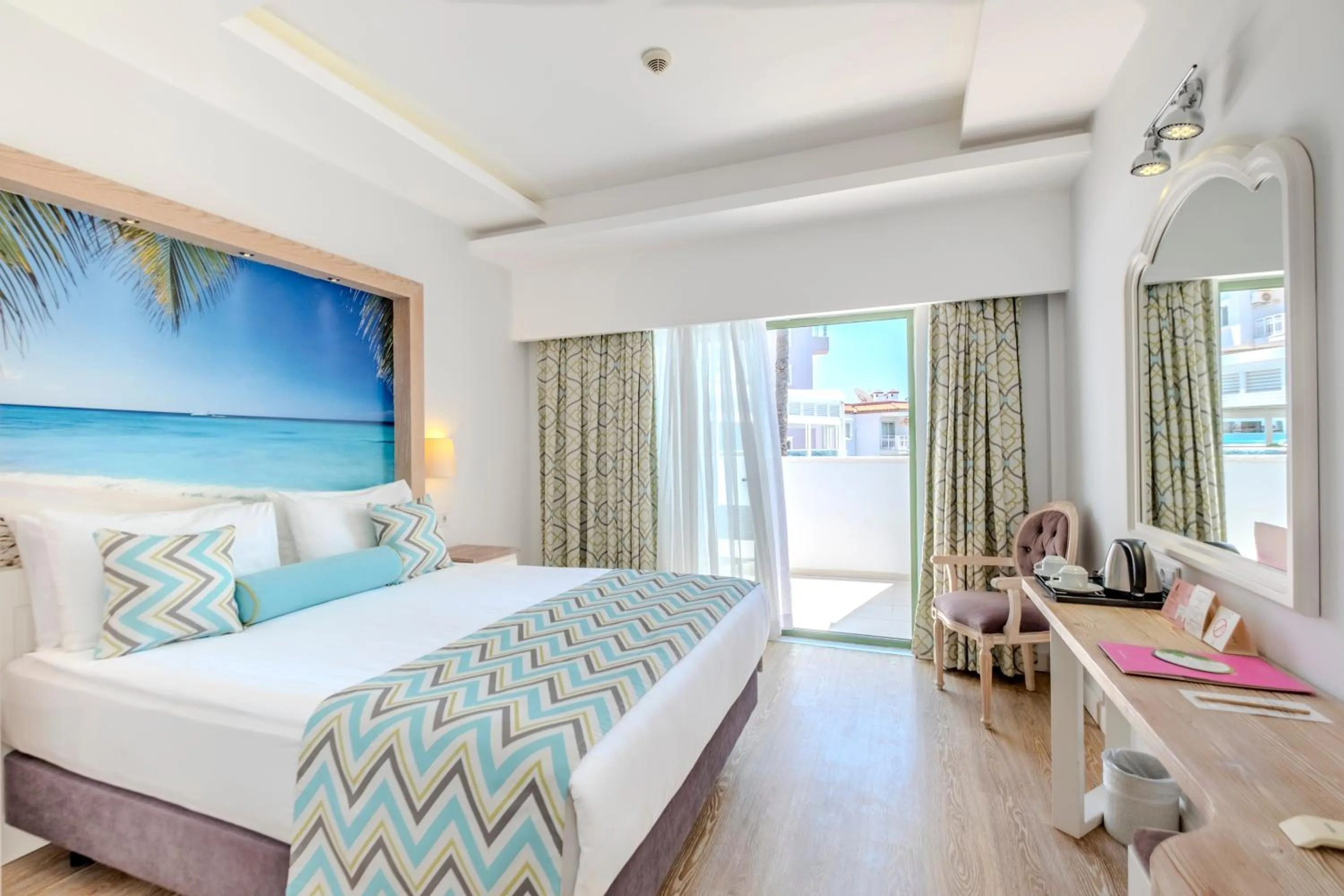 Bed in Iz Flower Side Beach Hotel