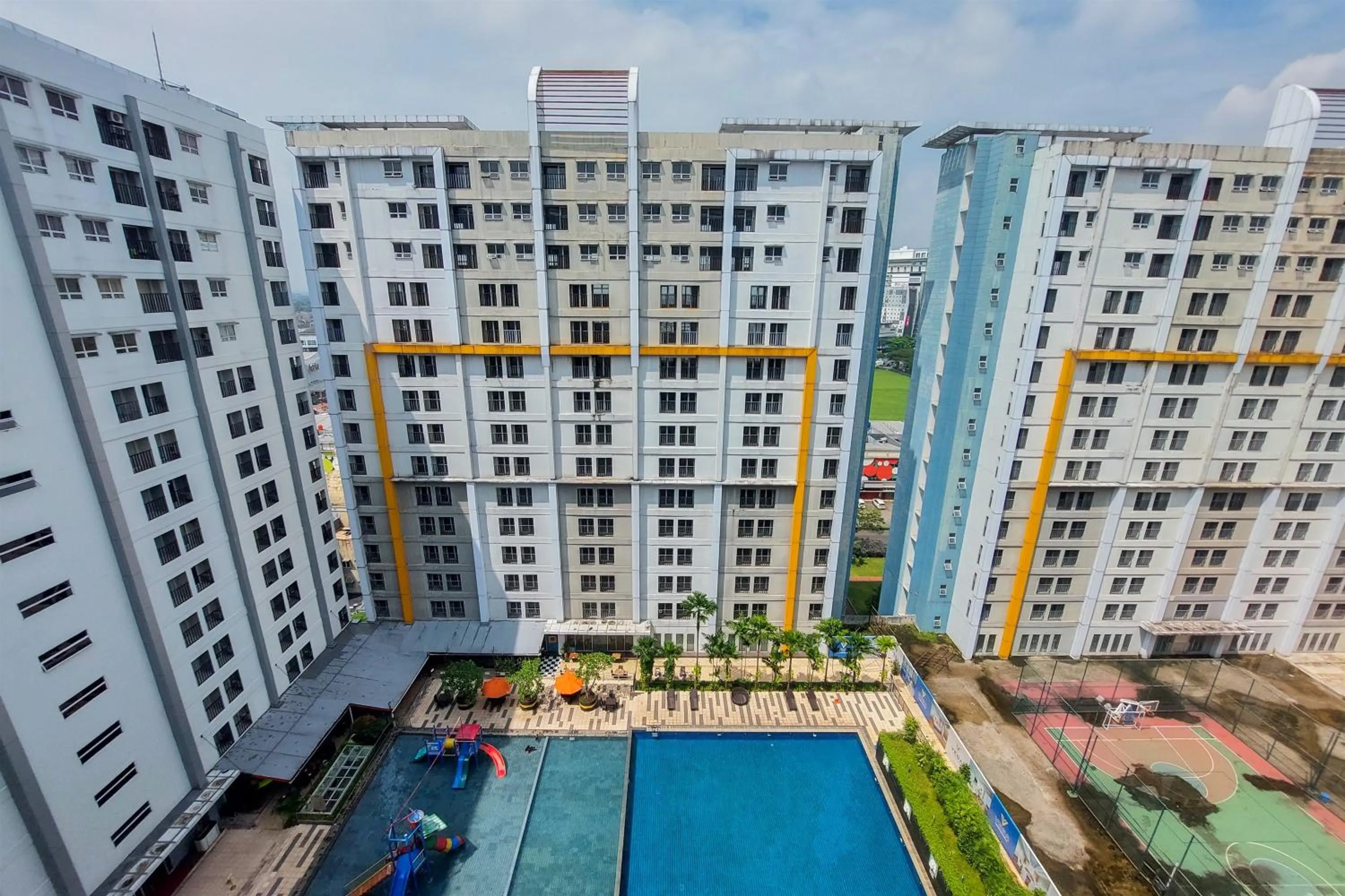 Swimming pool in Cozy Stay Studio at Paramount Skyline Apartment By Travelio