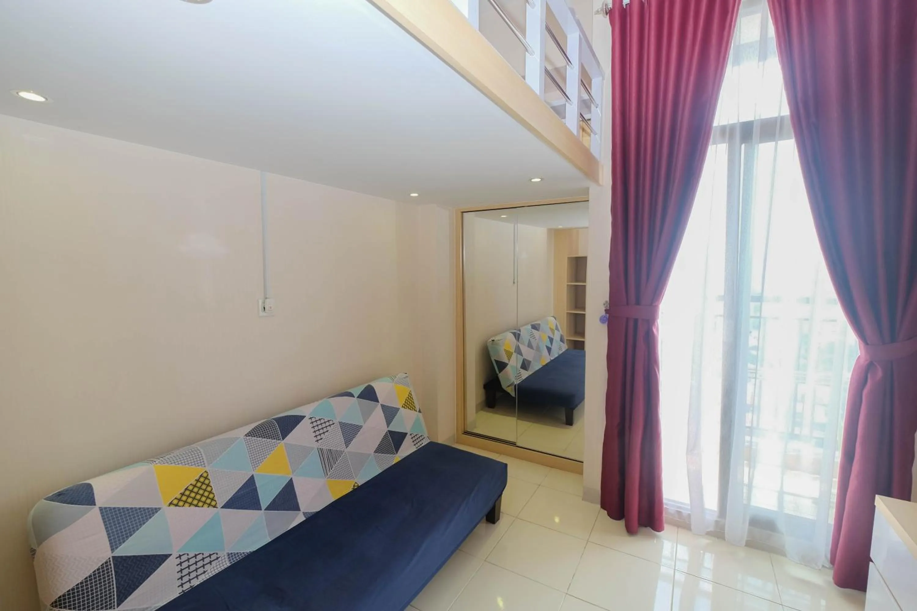 Bed in Comfy and Tidy Studio at Dave Apartment By Travelio