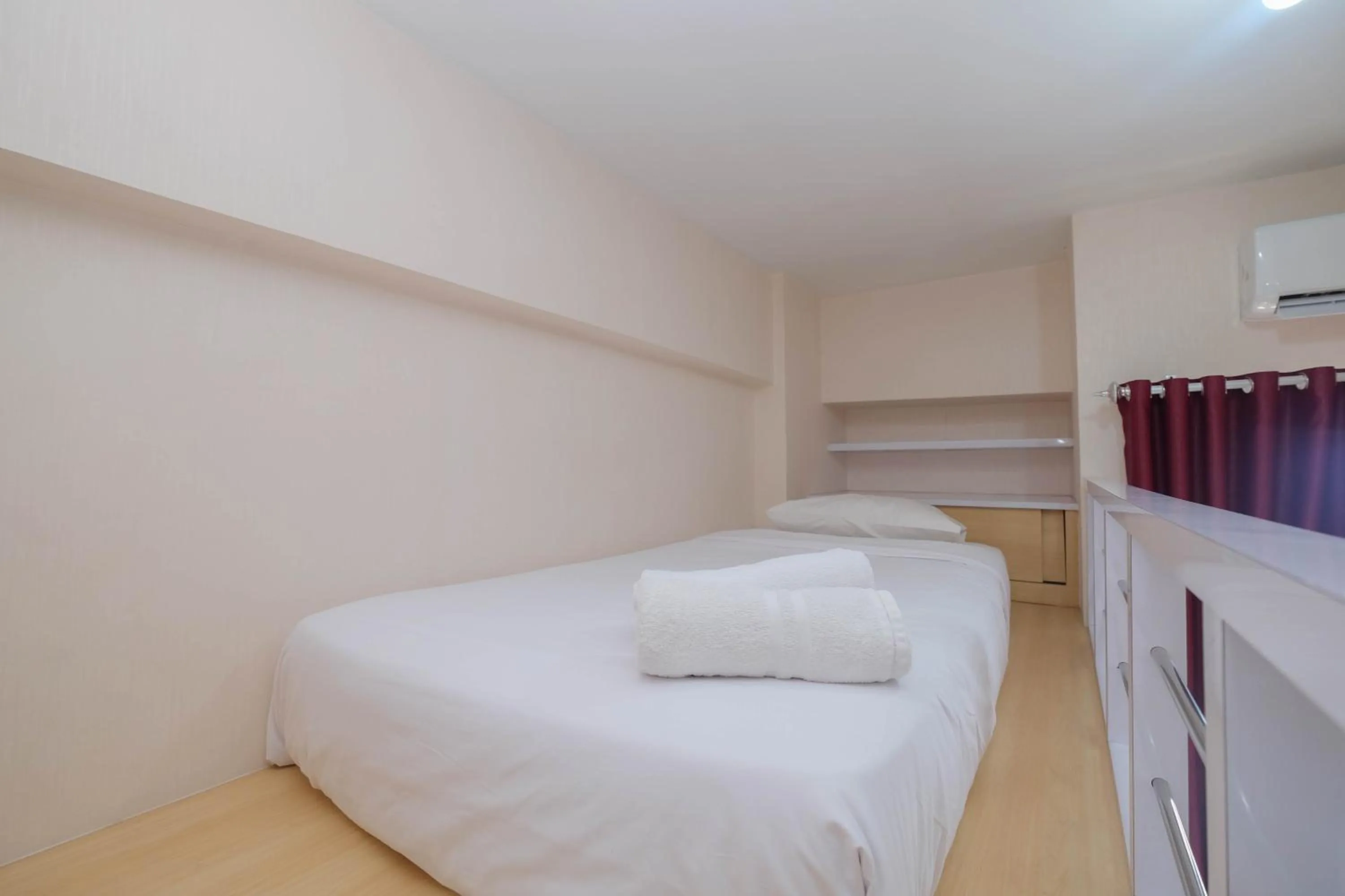 Bed in Comfy and Tidy Studio at Dave Apartment By Travelio