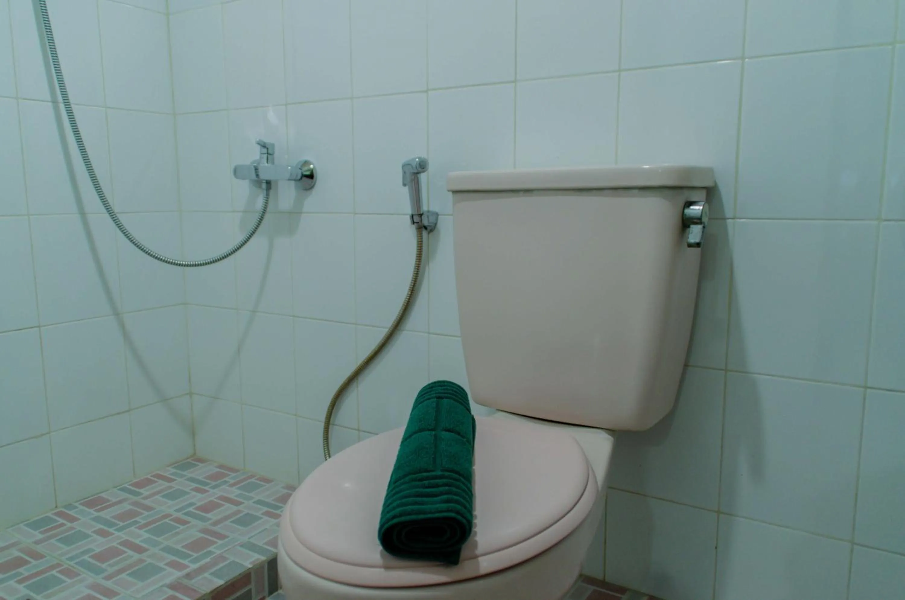 Spacious and Homey 3BR at Kondominium Rajawali Apartment By Travelio