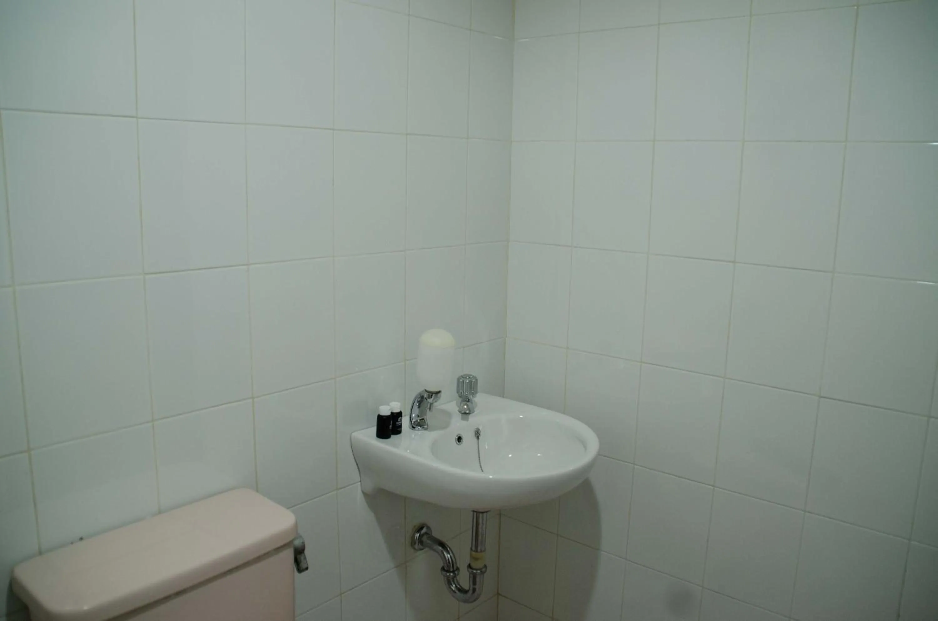 Spacious and Homey 3BR at Kondominium Rajawali Apartment By Travelio