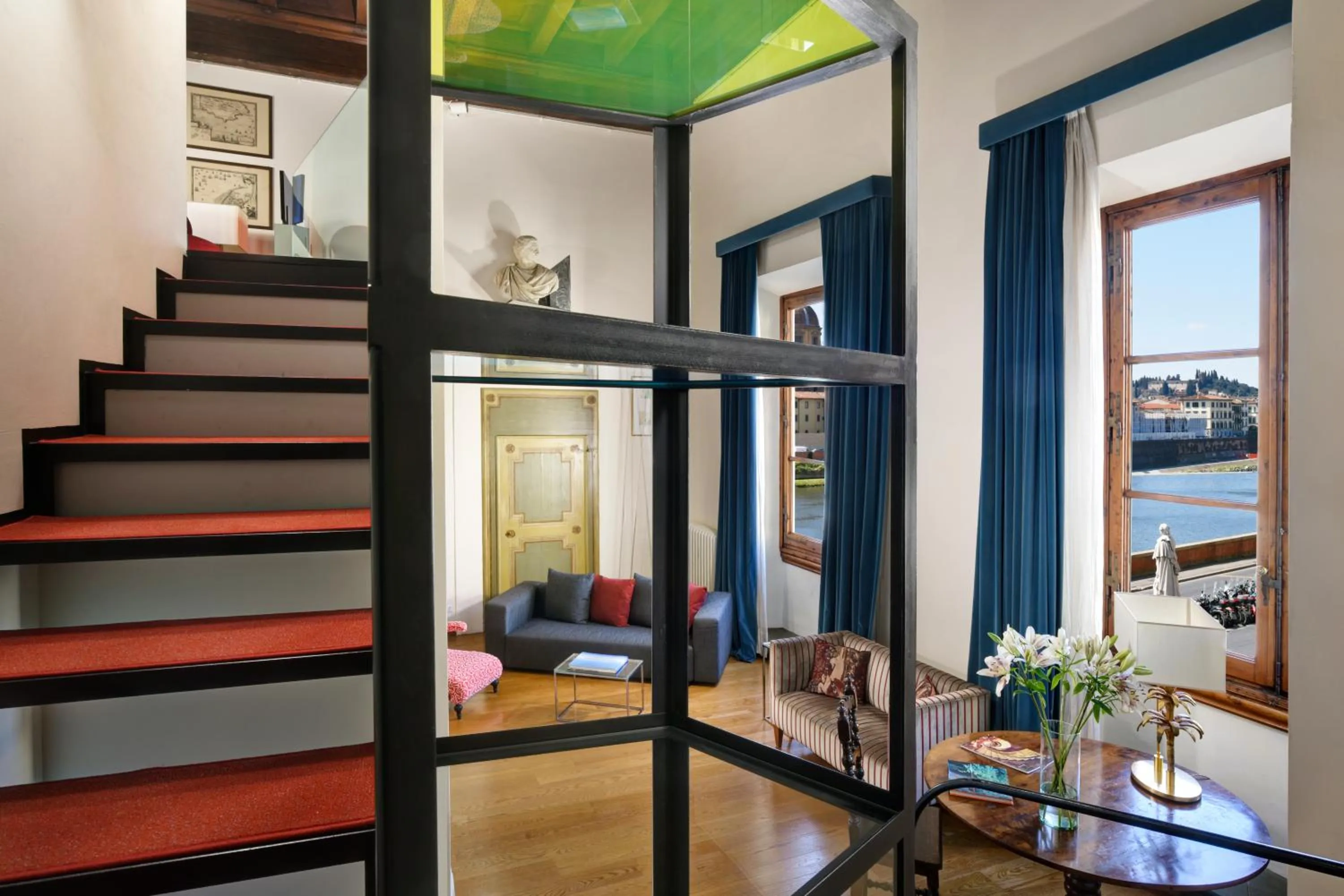 Seating area in Leone Blu Suites | UNA Esperienze