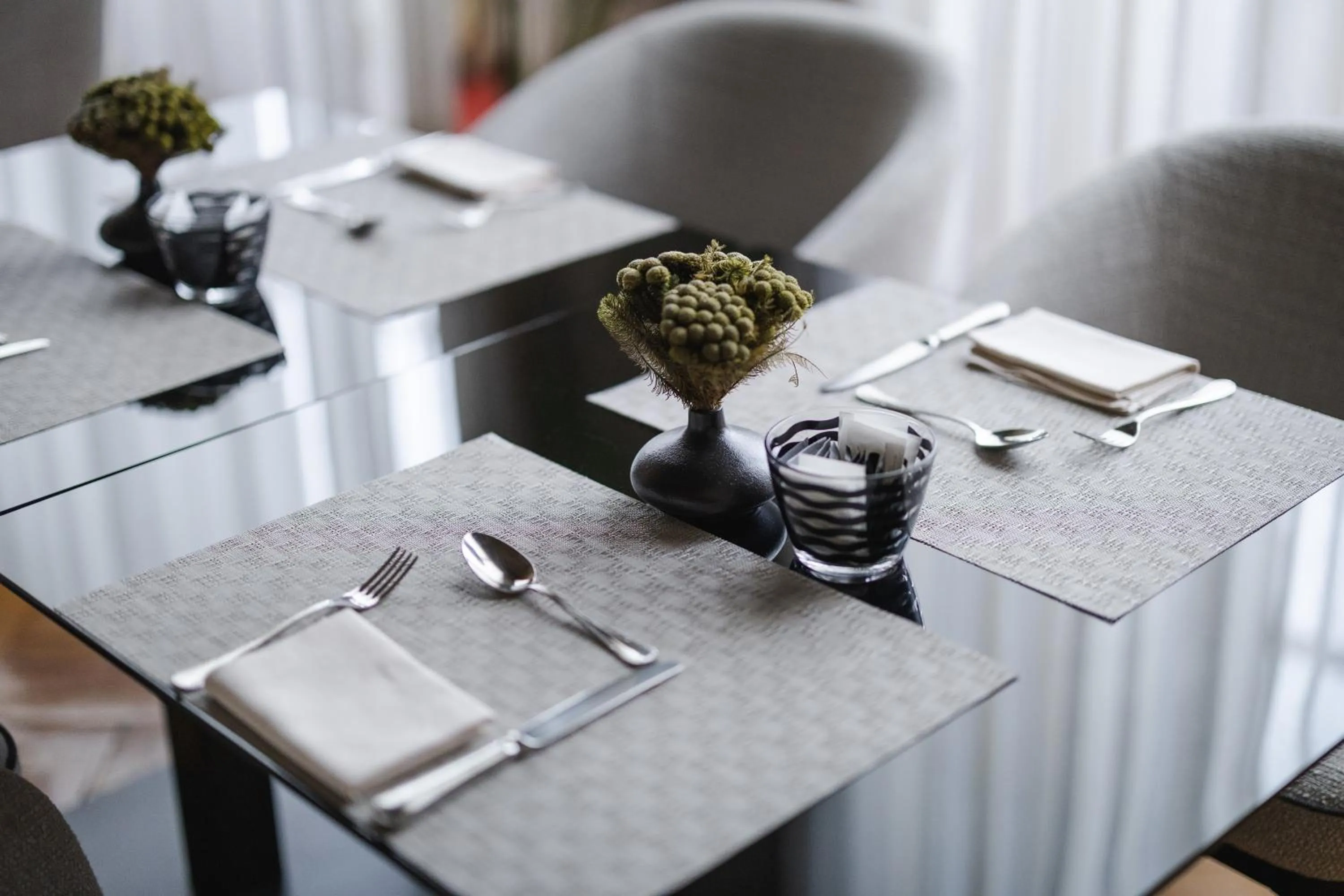 Dining area in Leone Blu Suites | UNA Esperienze