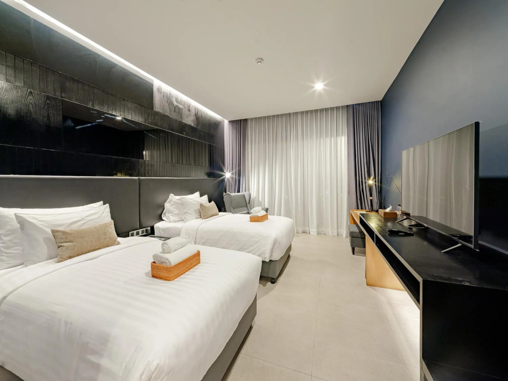 Bed in The Grandiose Hotel Chiang Rai เดอะแกรนด์ดิโอสเชียงราย