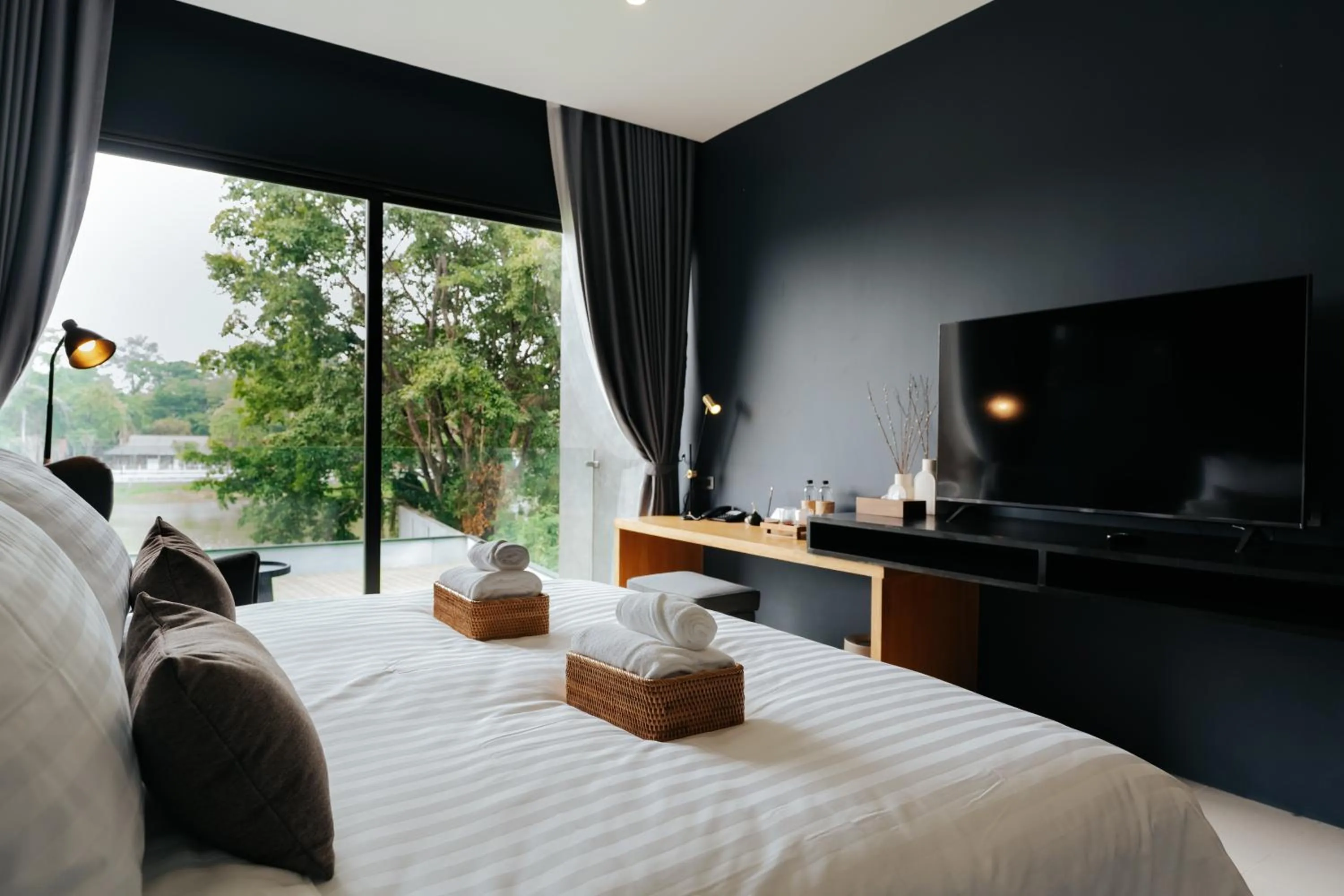 Bed in The Grandiose Hotel Chiang Rai เดอะแกรนด์ดิโอสเชียงราย