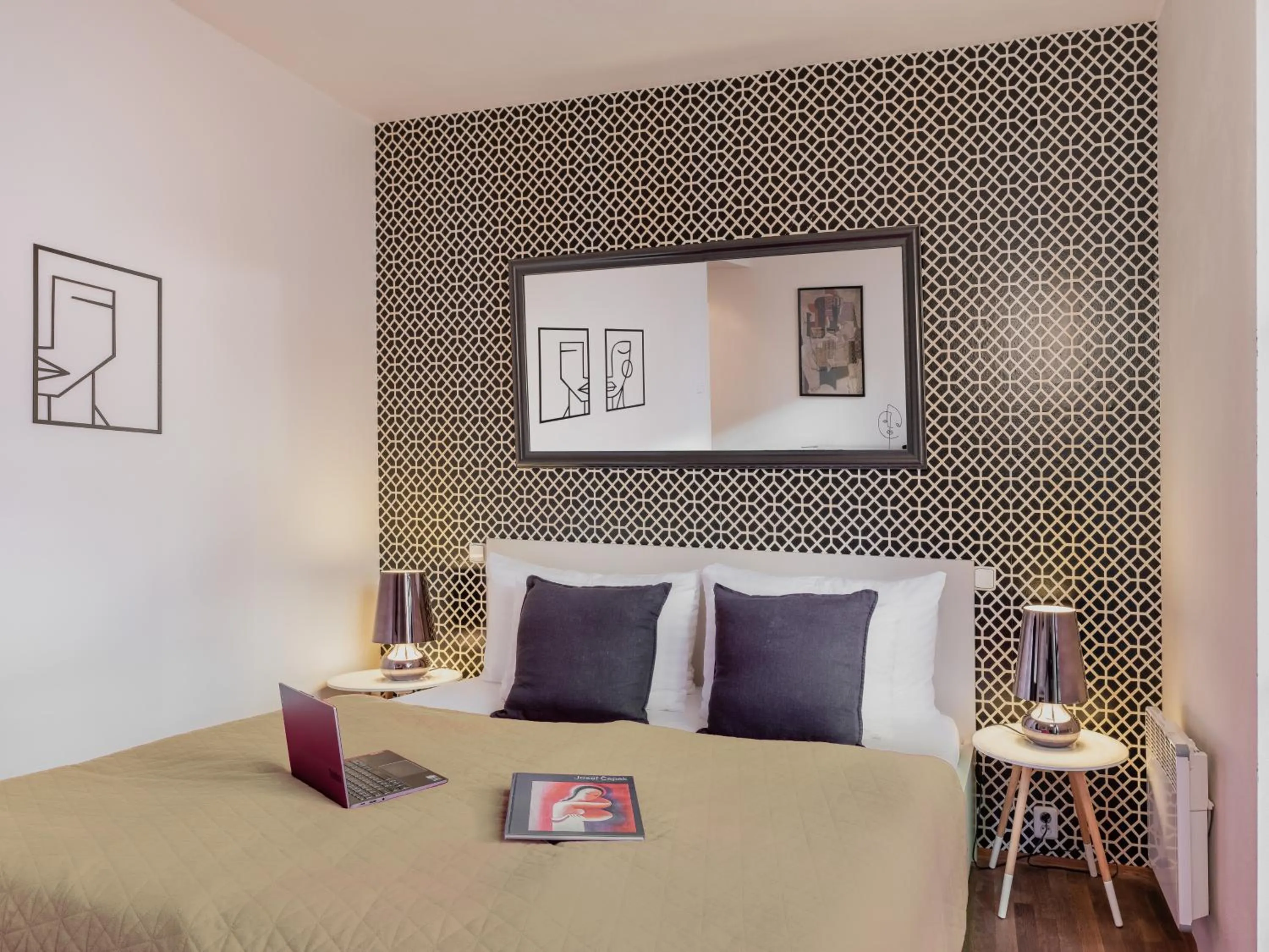 Bed in 4 Arts Apartments by Adrez