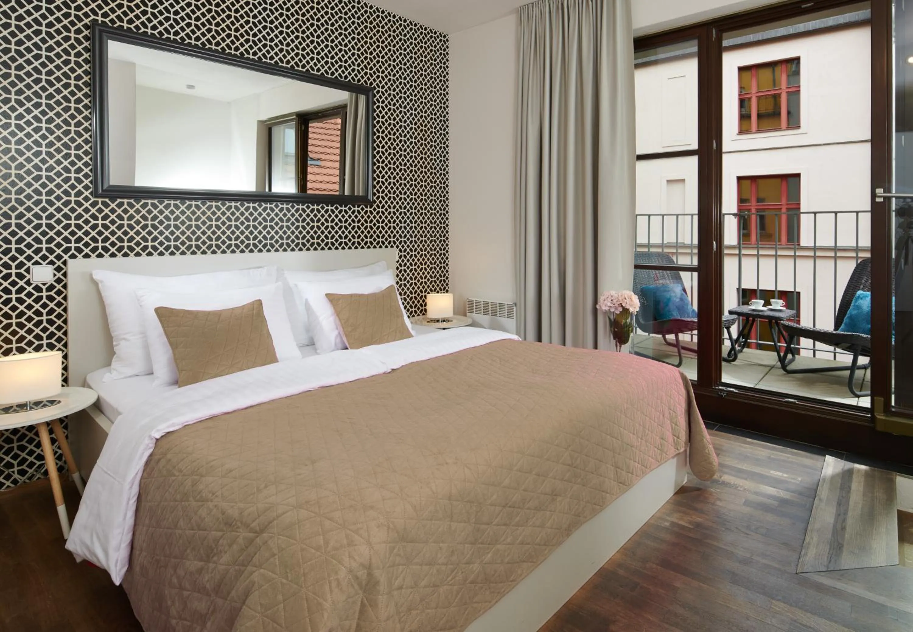 Bed in 4 Arts Apartments by Adrez