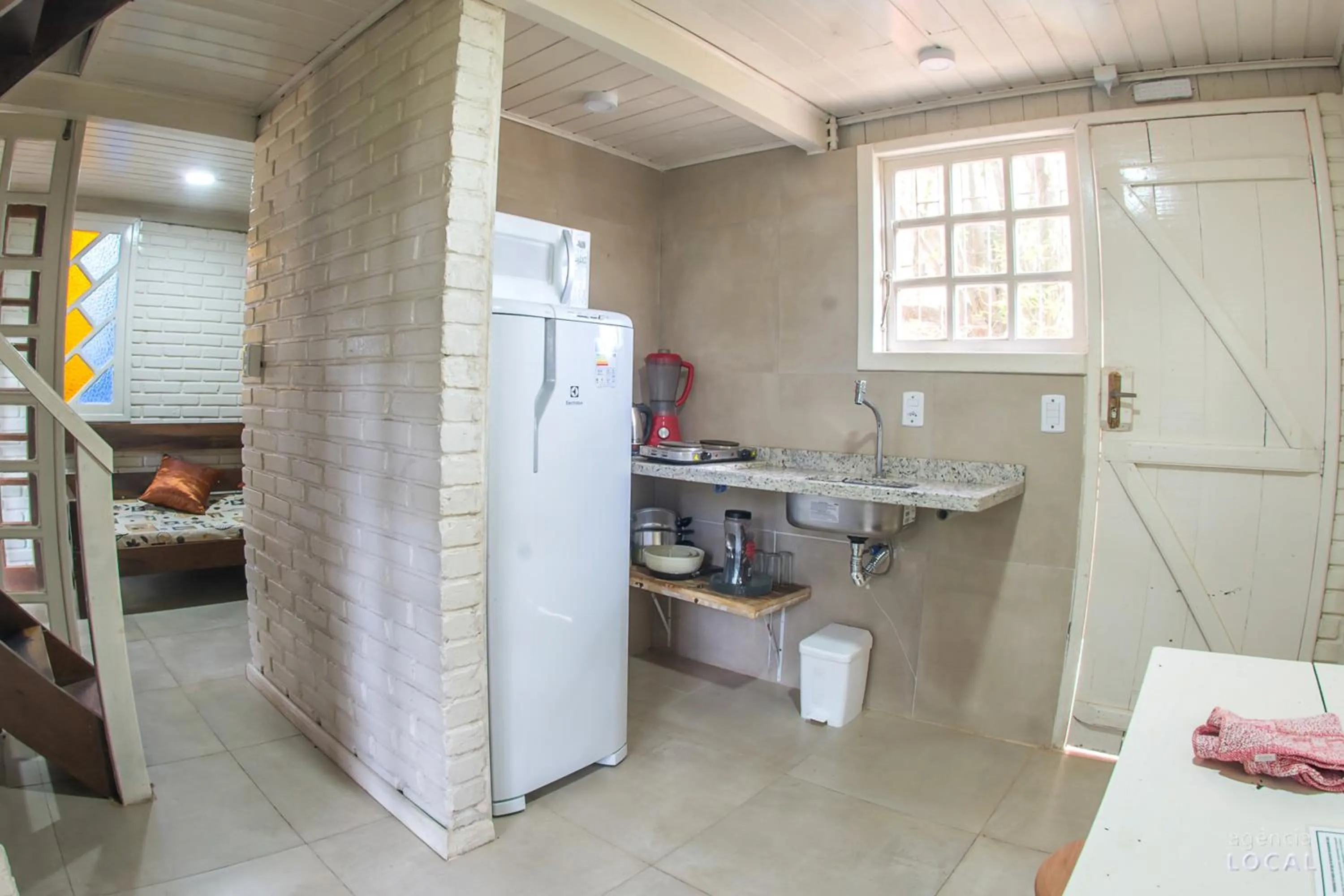 Kitchen or kitchenette, Bed in Pousada Rosa