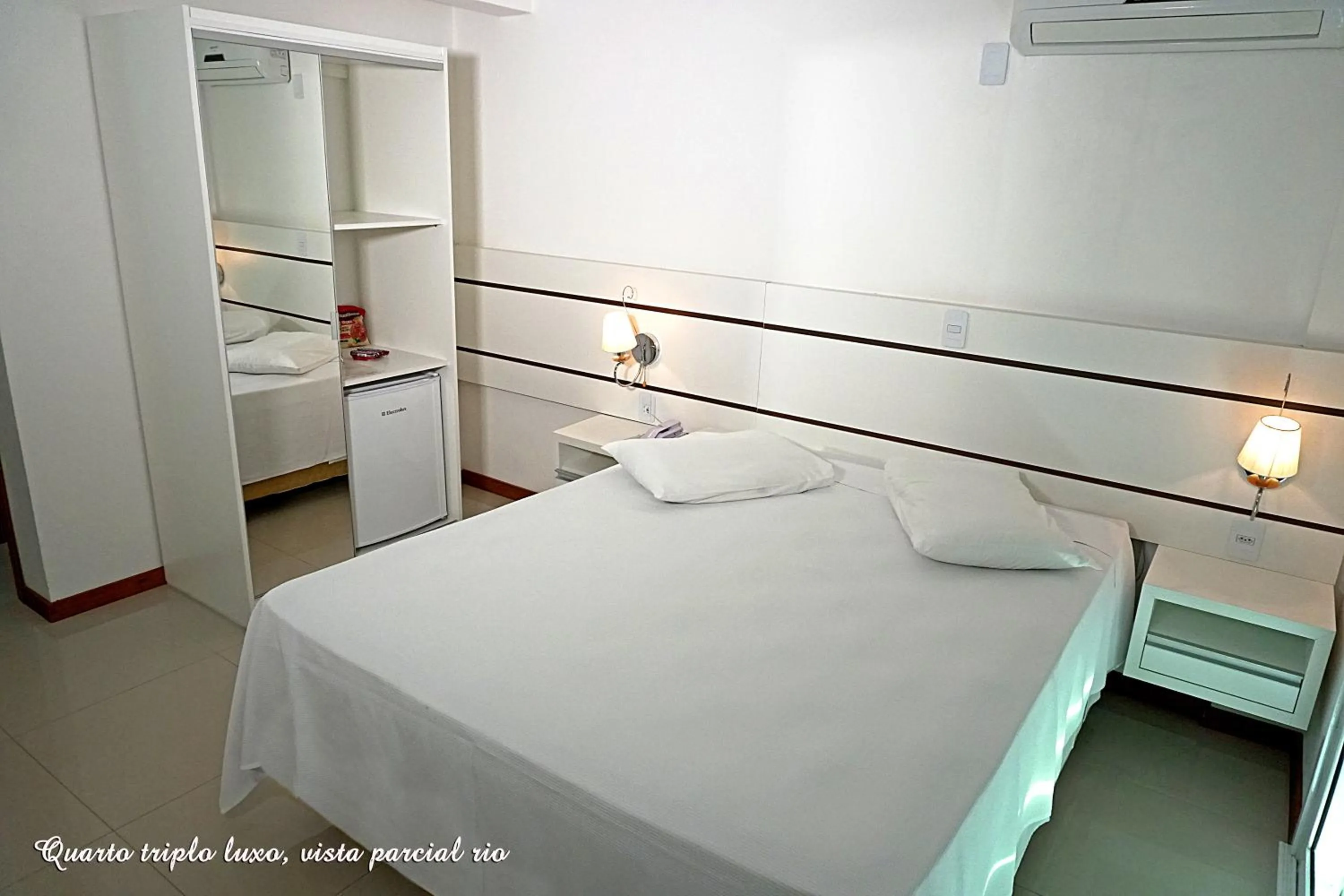 Bed in Pousada Molhes da Barra