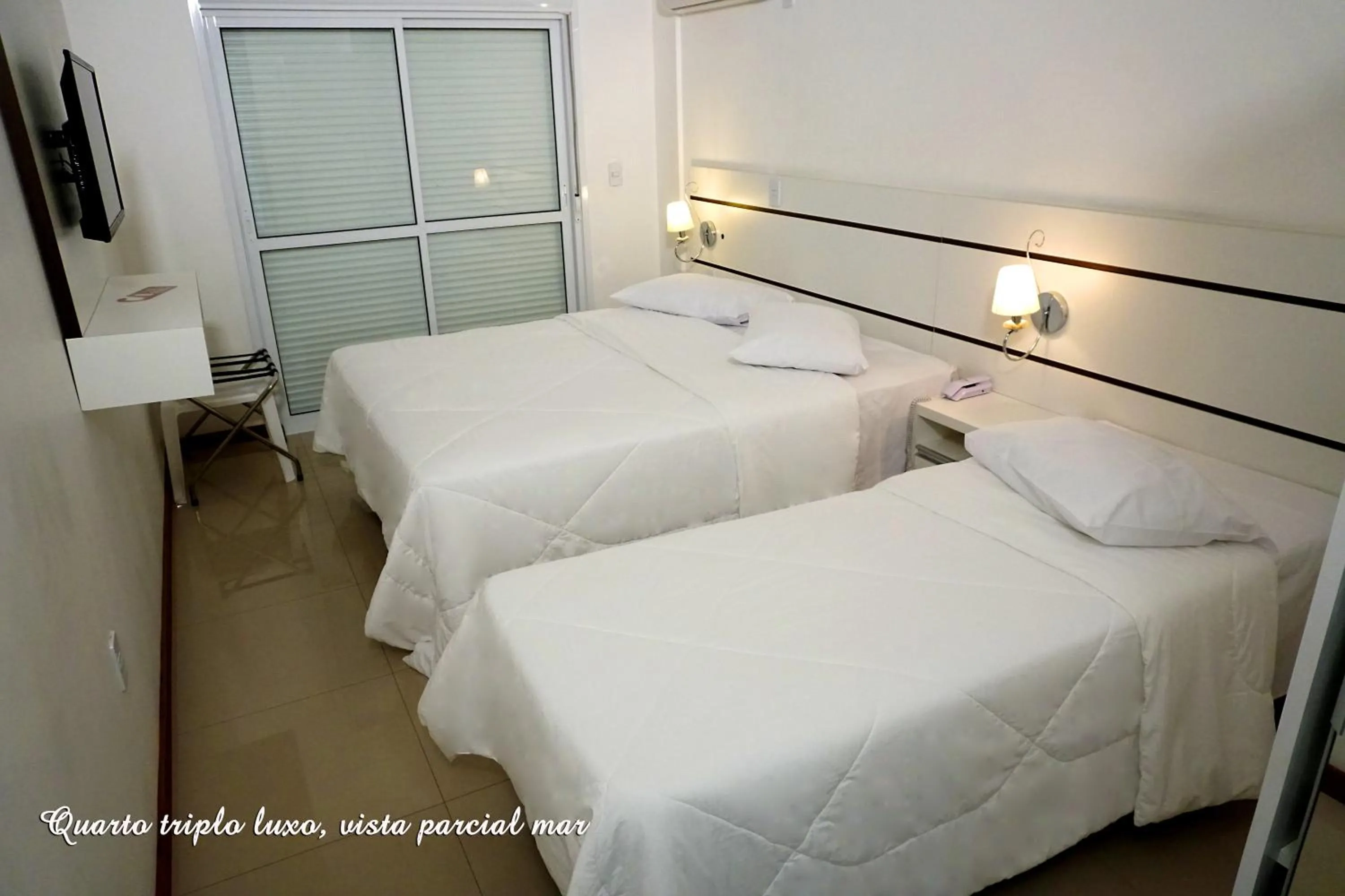 Bed in Pousada Molhes da Barra