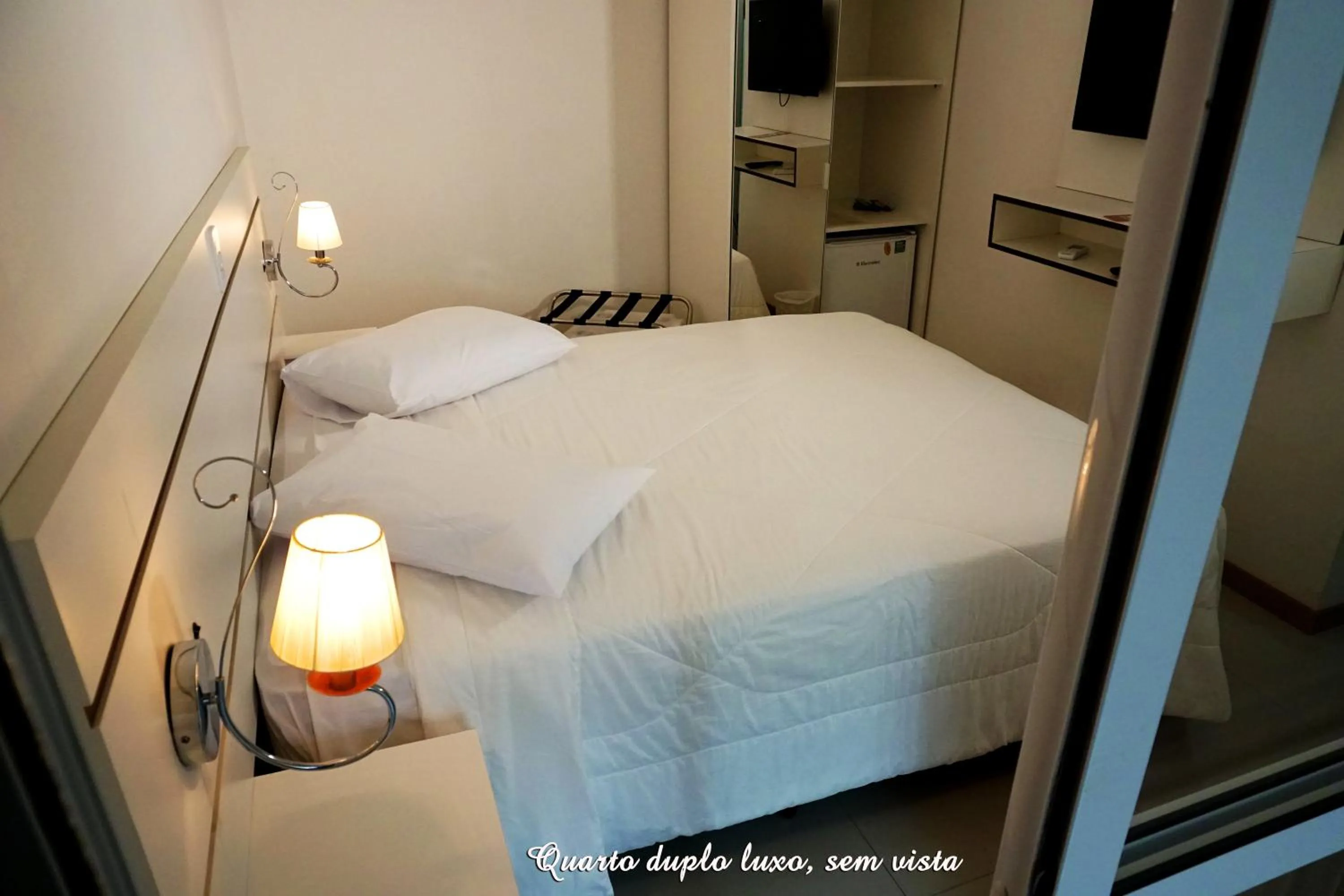 Bed in Pousada Molhes da Barra