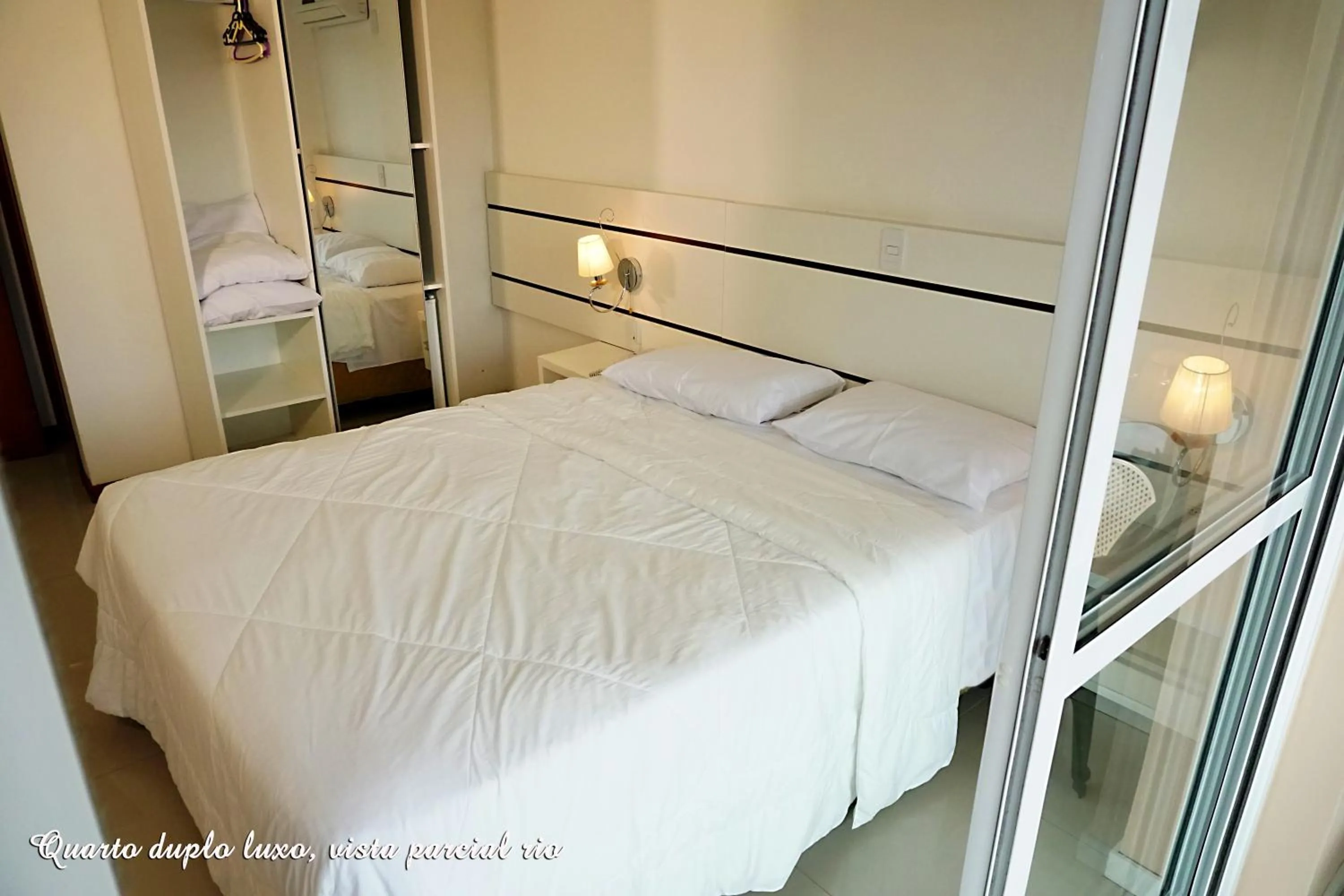 Bed in Pousada Molhes da Barra