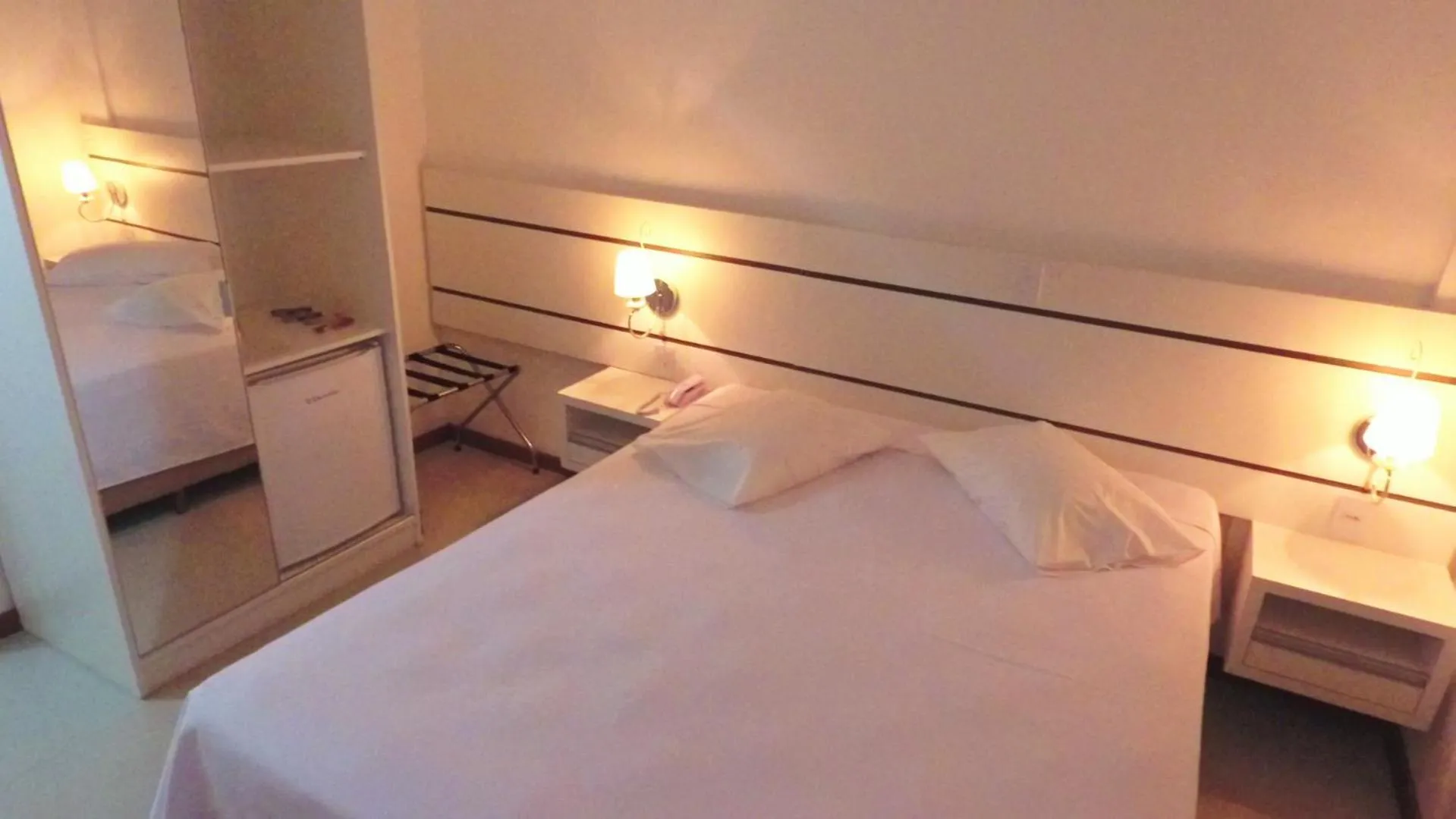 Photo of the whole room, Bed in Pousada Molhes da Barra