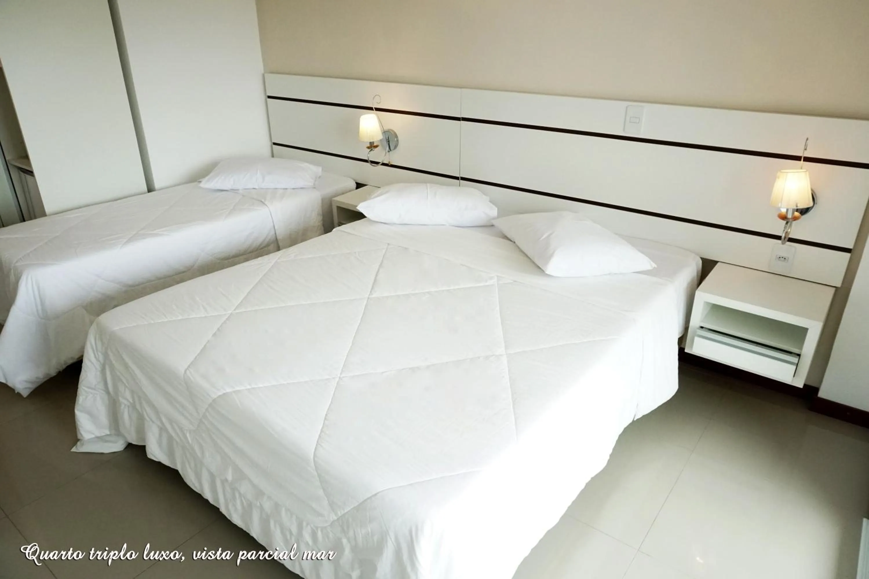 Bed in Pousada Molhes da Barra