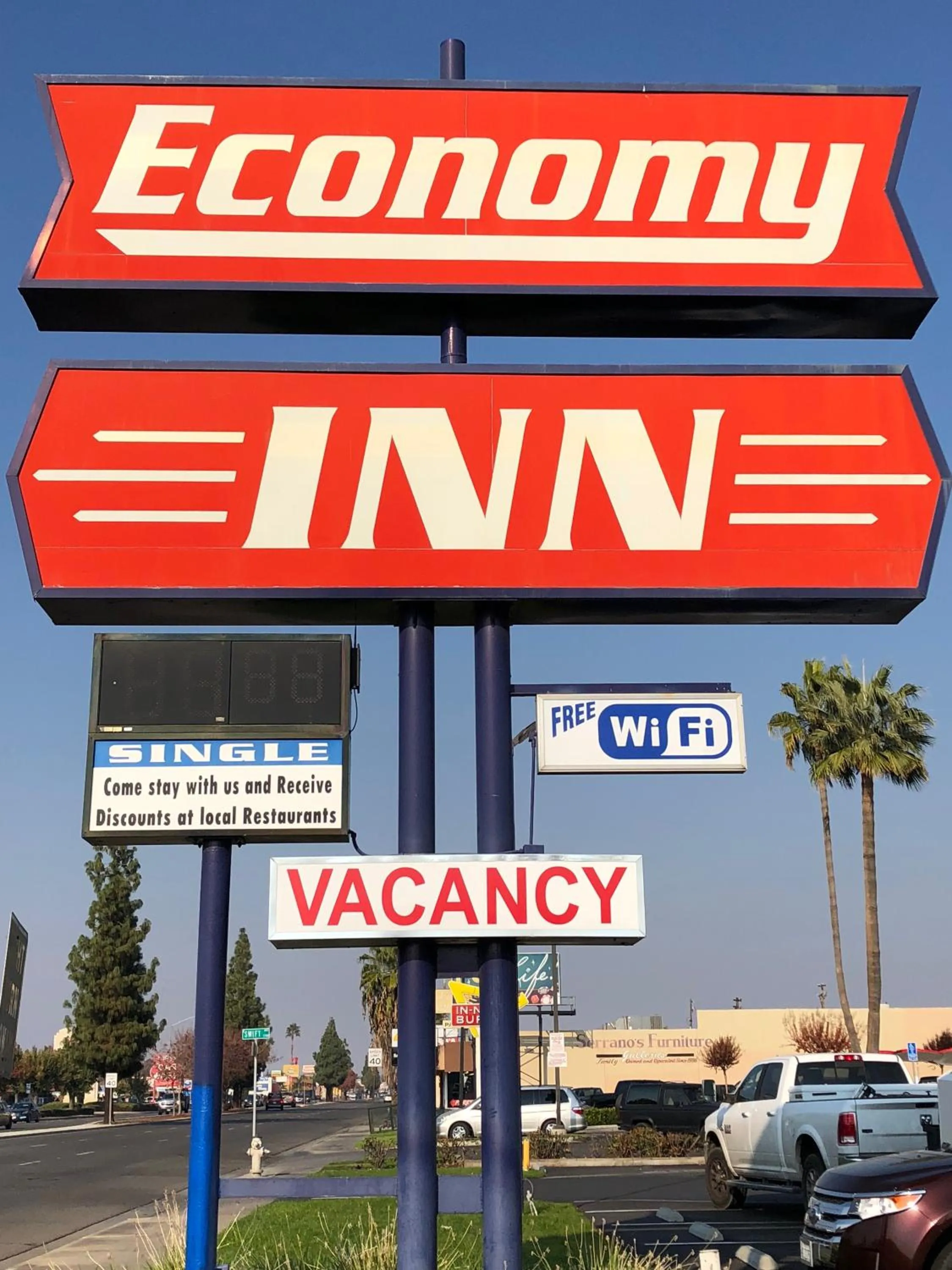 Property logo or sign in Economy Inn Fresno Yosemite