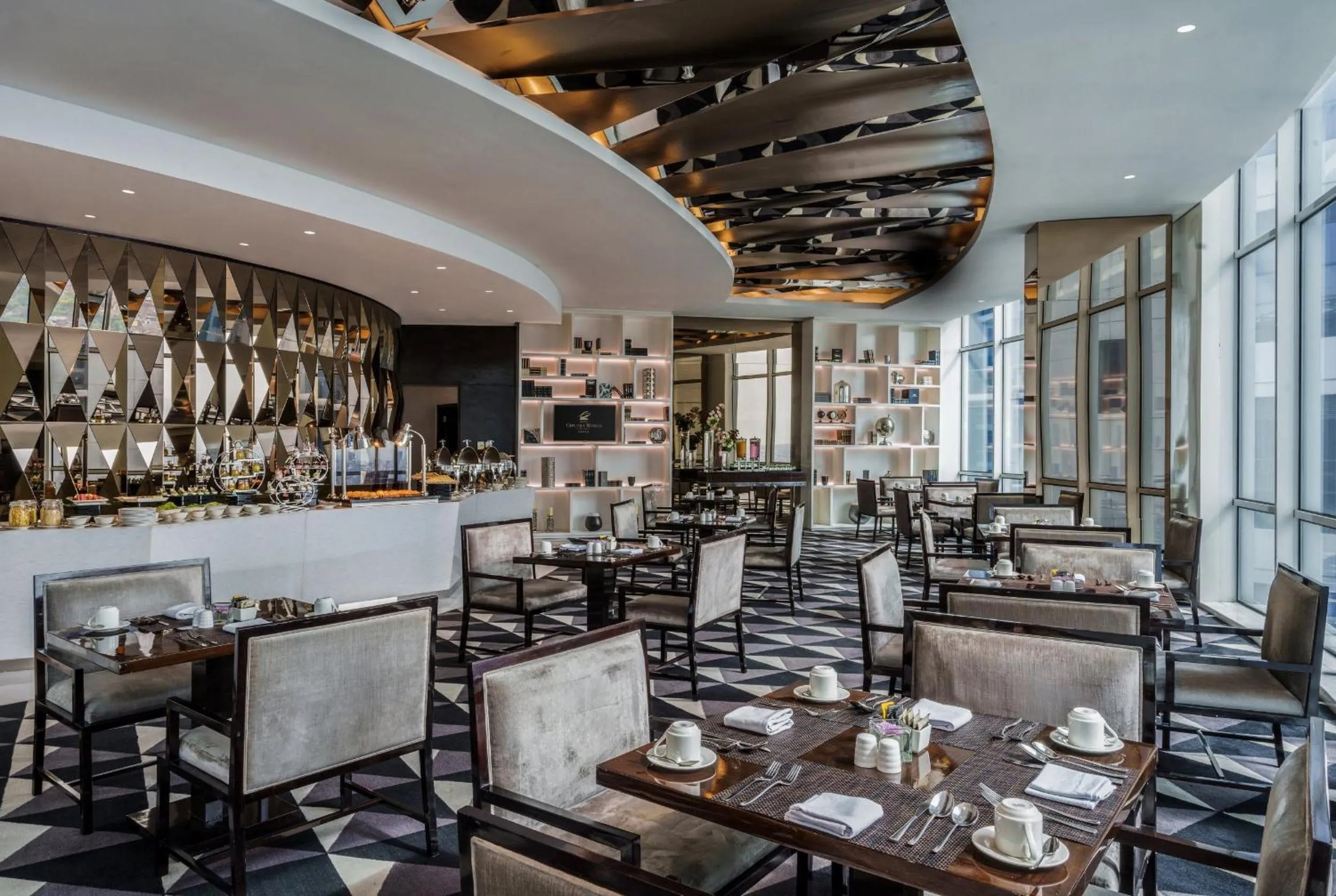 Lounge or bar in Hotel Ciputra World Surabaya managed by Swiss-Belhotel International