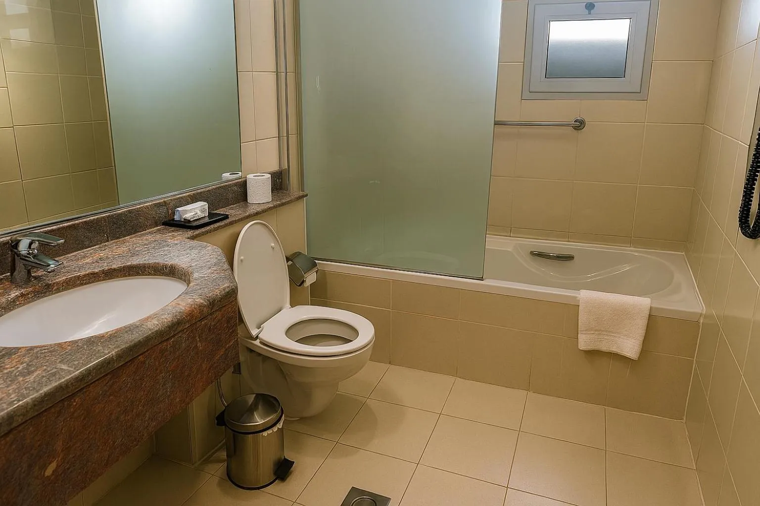 Toilet in Raviz Center Point Hotel