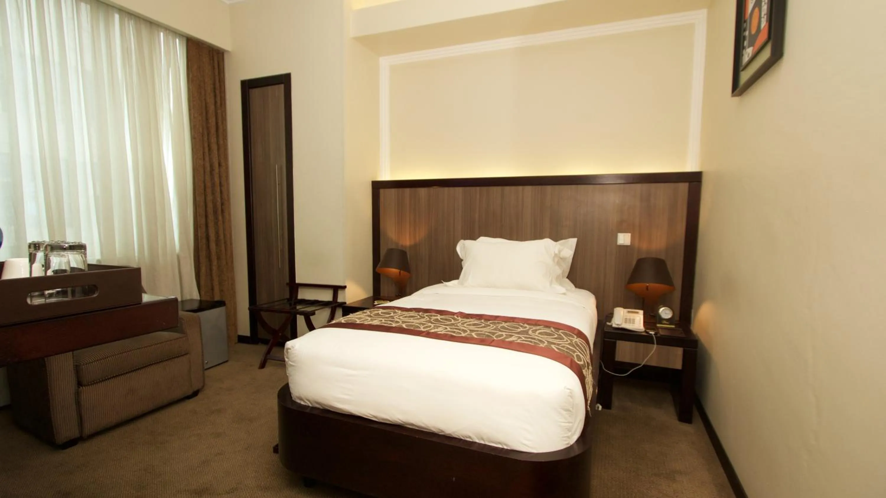 Bed in Elilly International Hotel