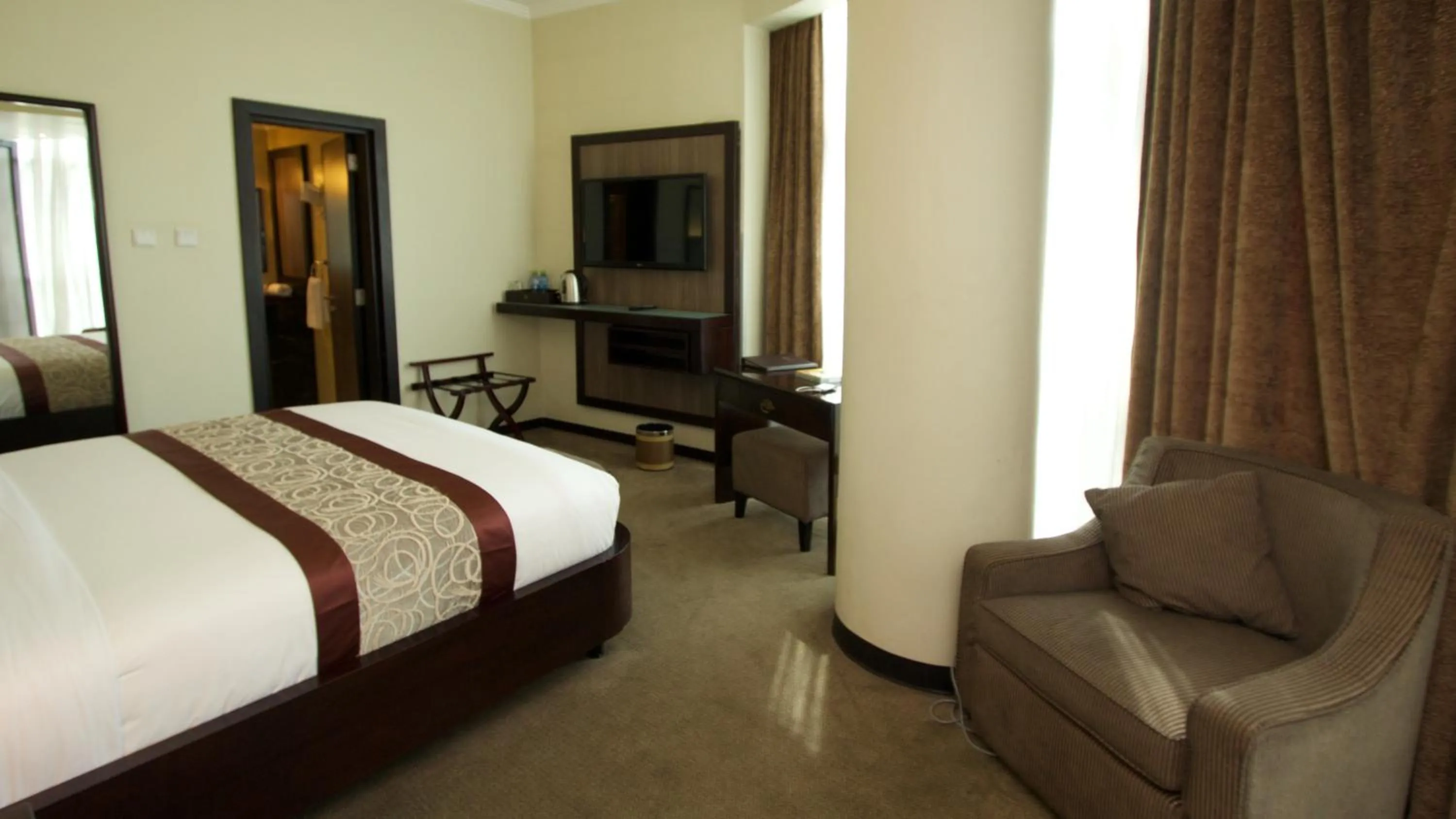 Bed in Elilly International Hotel