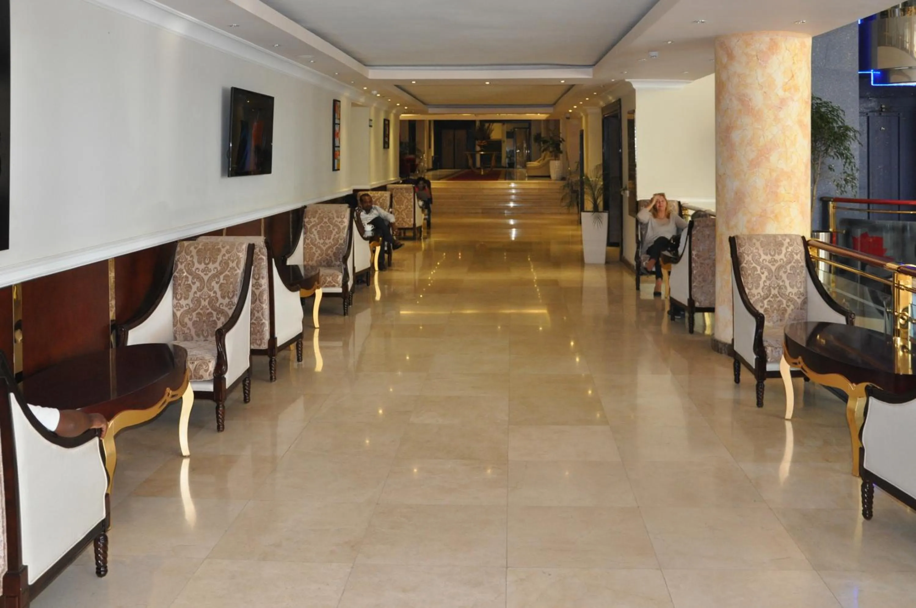 Lobby or reception in Elilly International Hotel