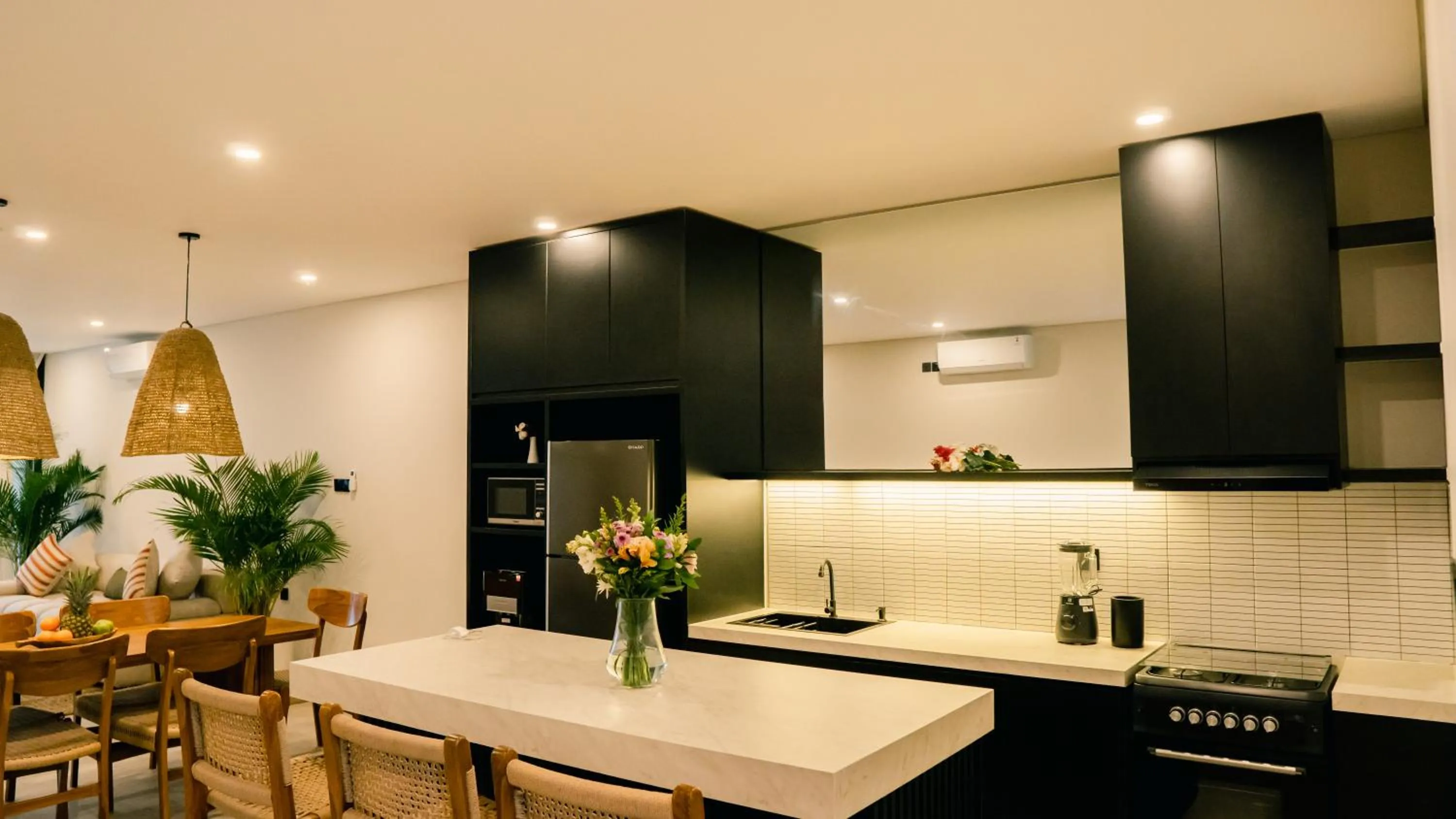 Kitchen or kitchenette in The Menuai Bali Villas Canggu