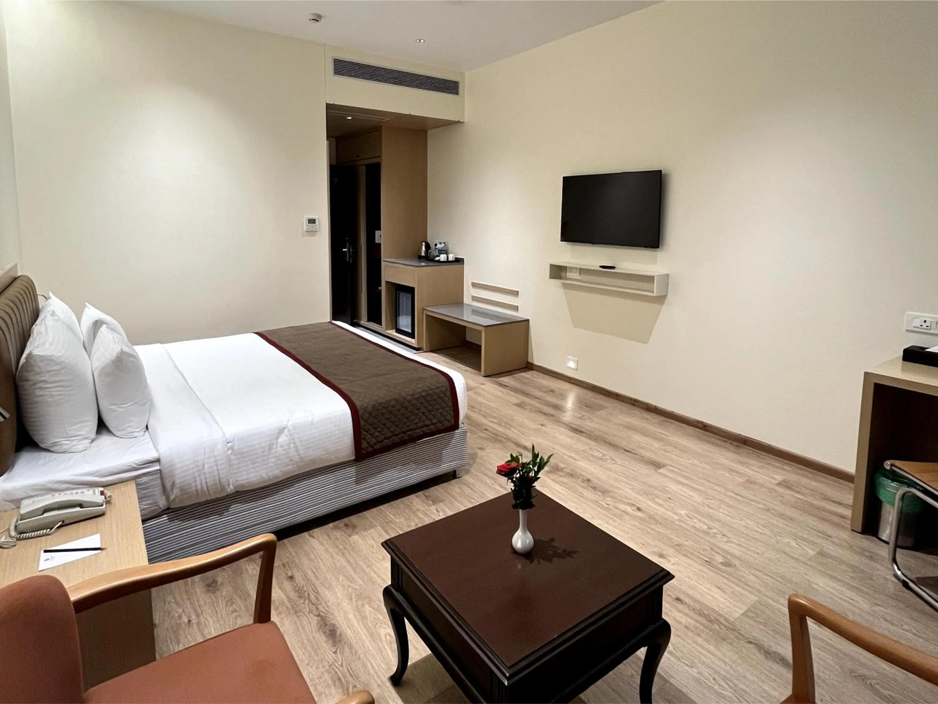 Living room, Bed in Ramee Panchshil