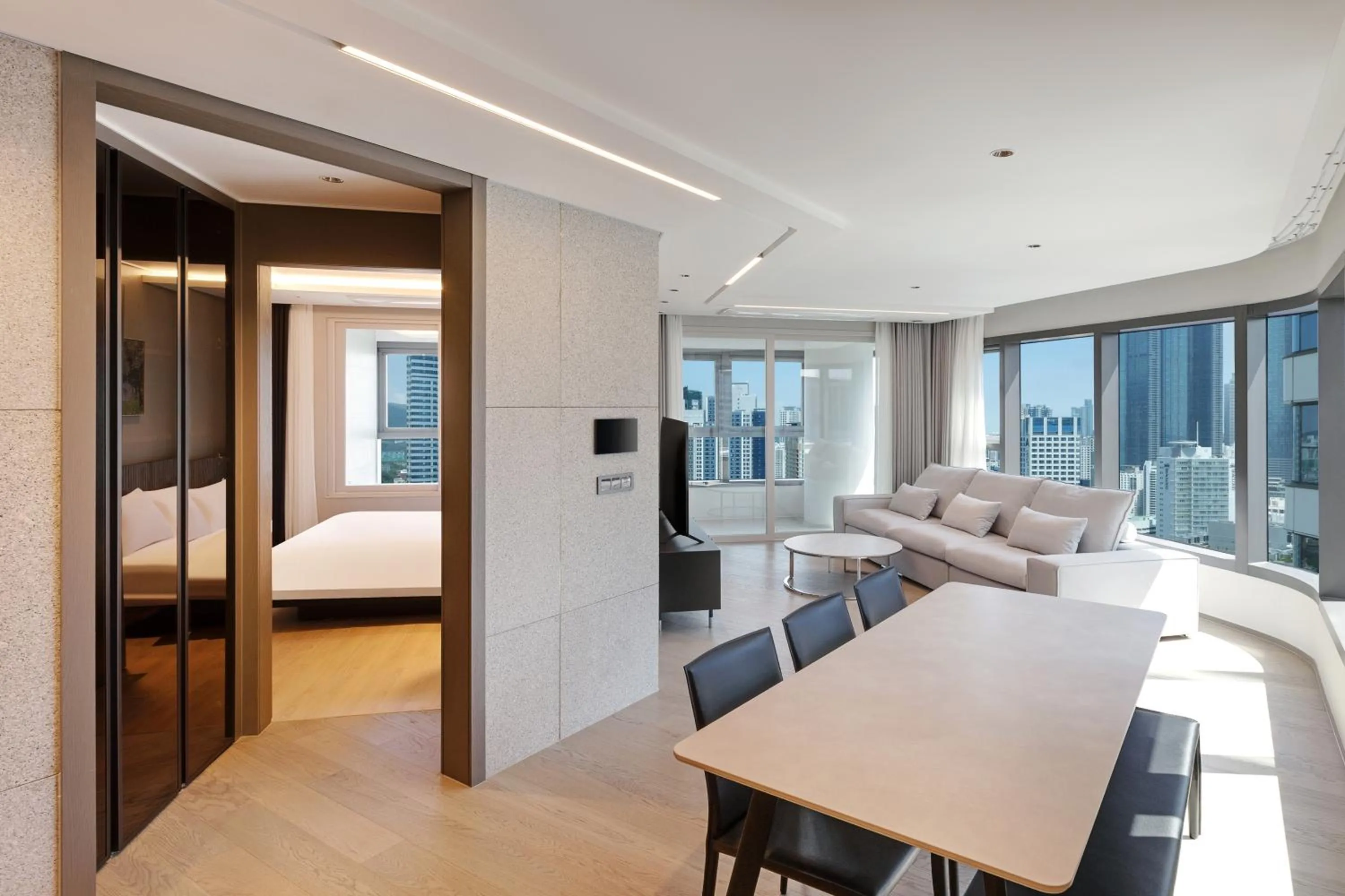 Living room, Bed in NewCZ Haeundae Residence