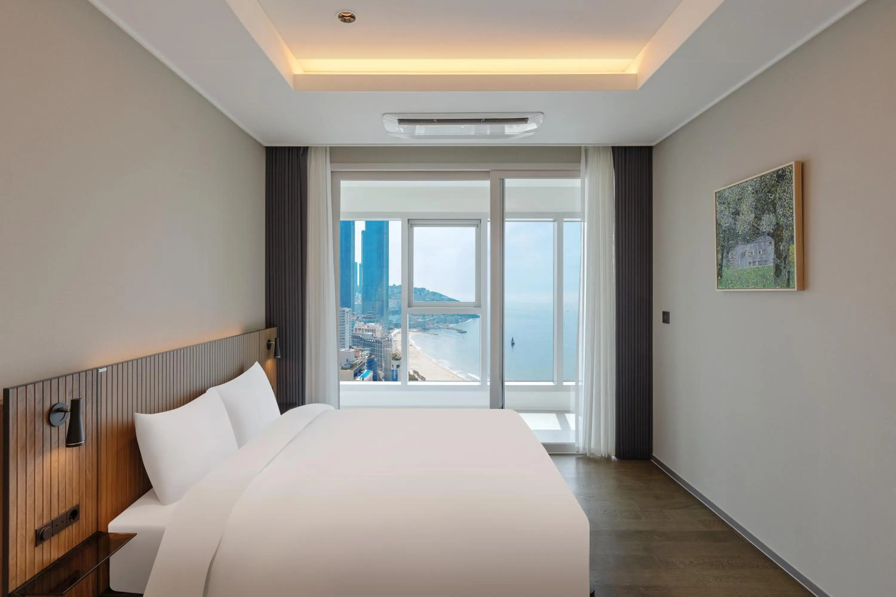 Bed in NewCZ Haeundae Residence