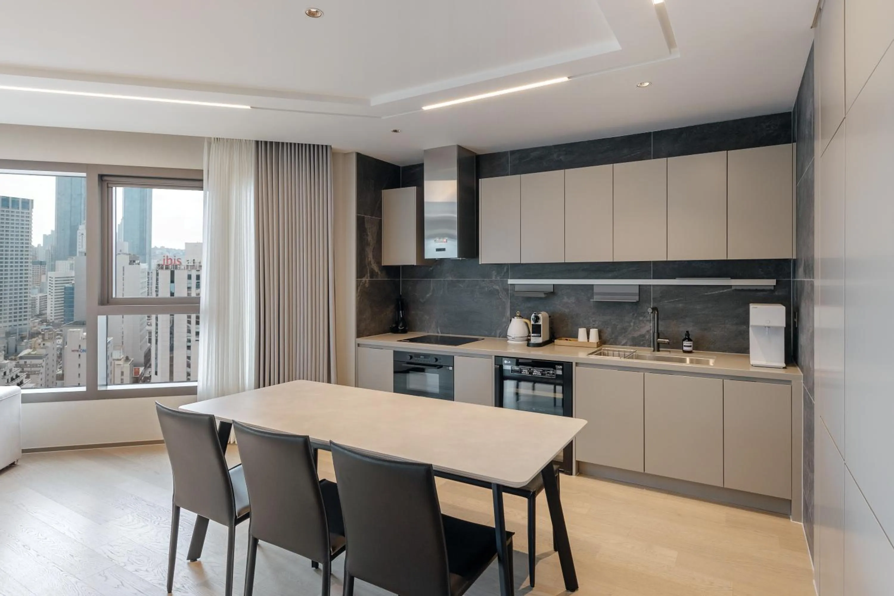 Kitchen or kitchenette in NewCZ Haeundae Residence