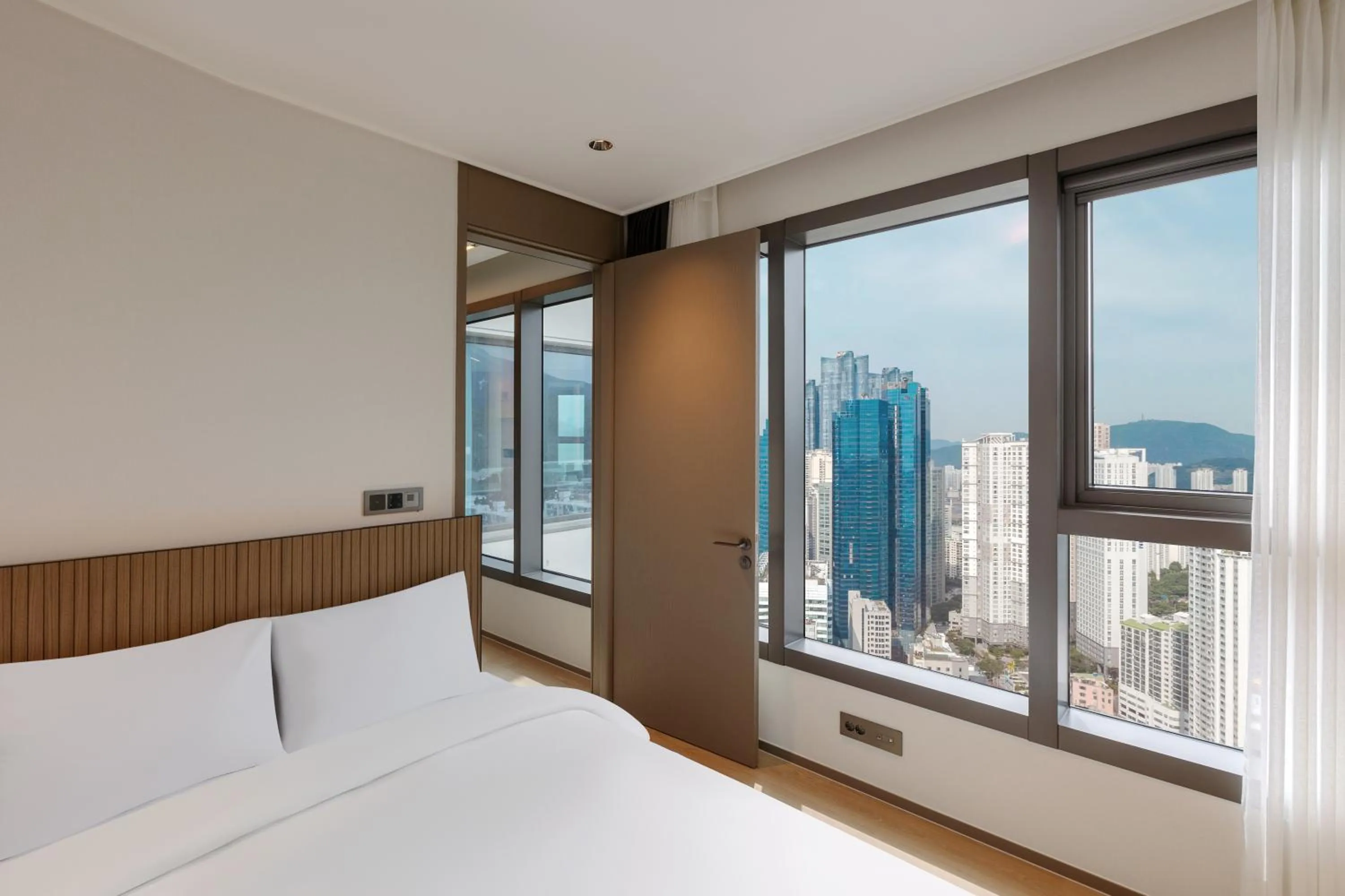 Bedroom, Bed in NewCZ Haeundae Residence
