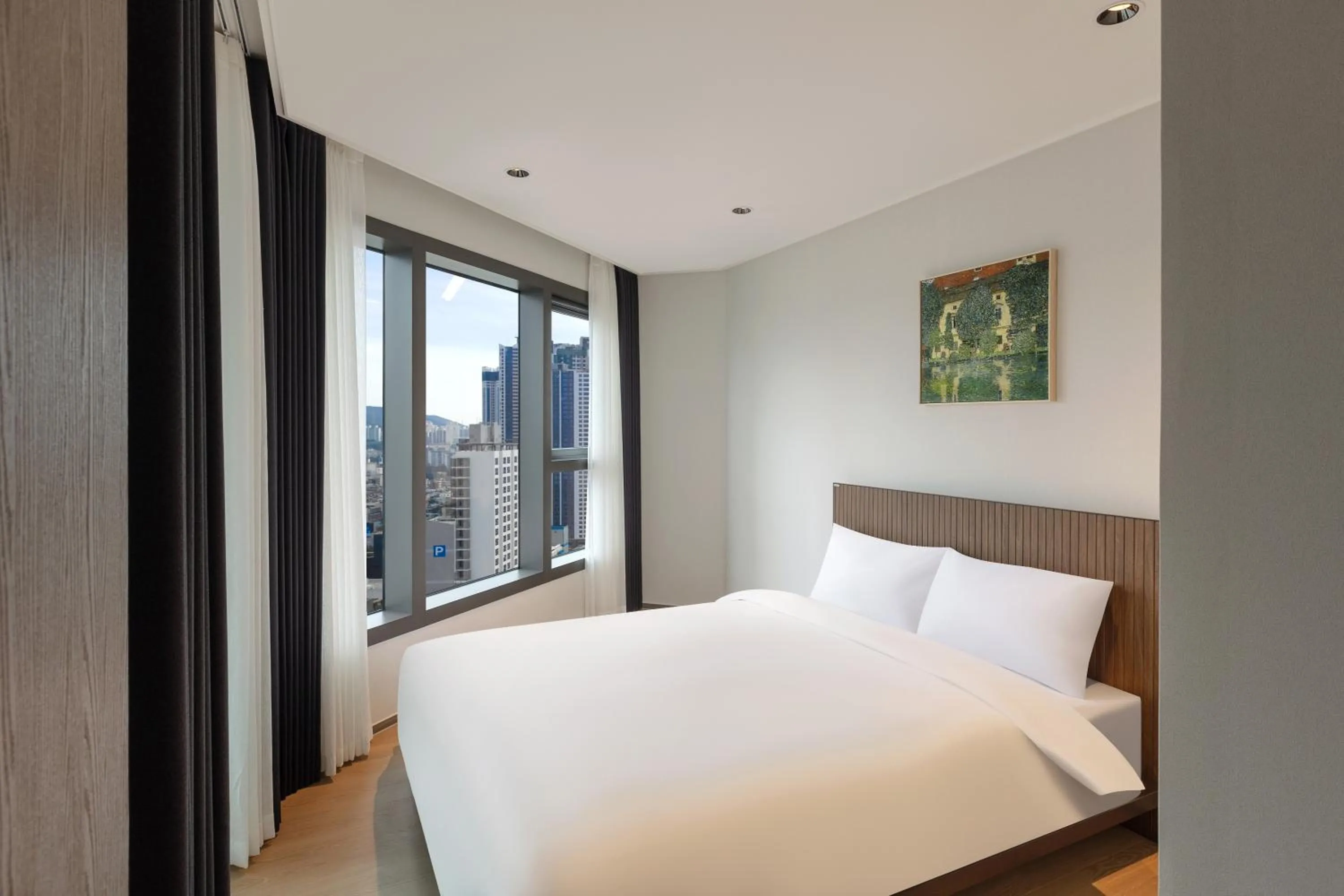 Bed in NewCZ Haeundae Residence