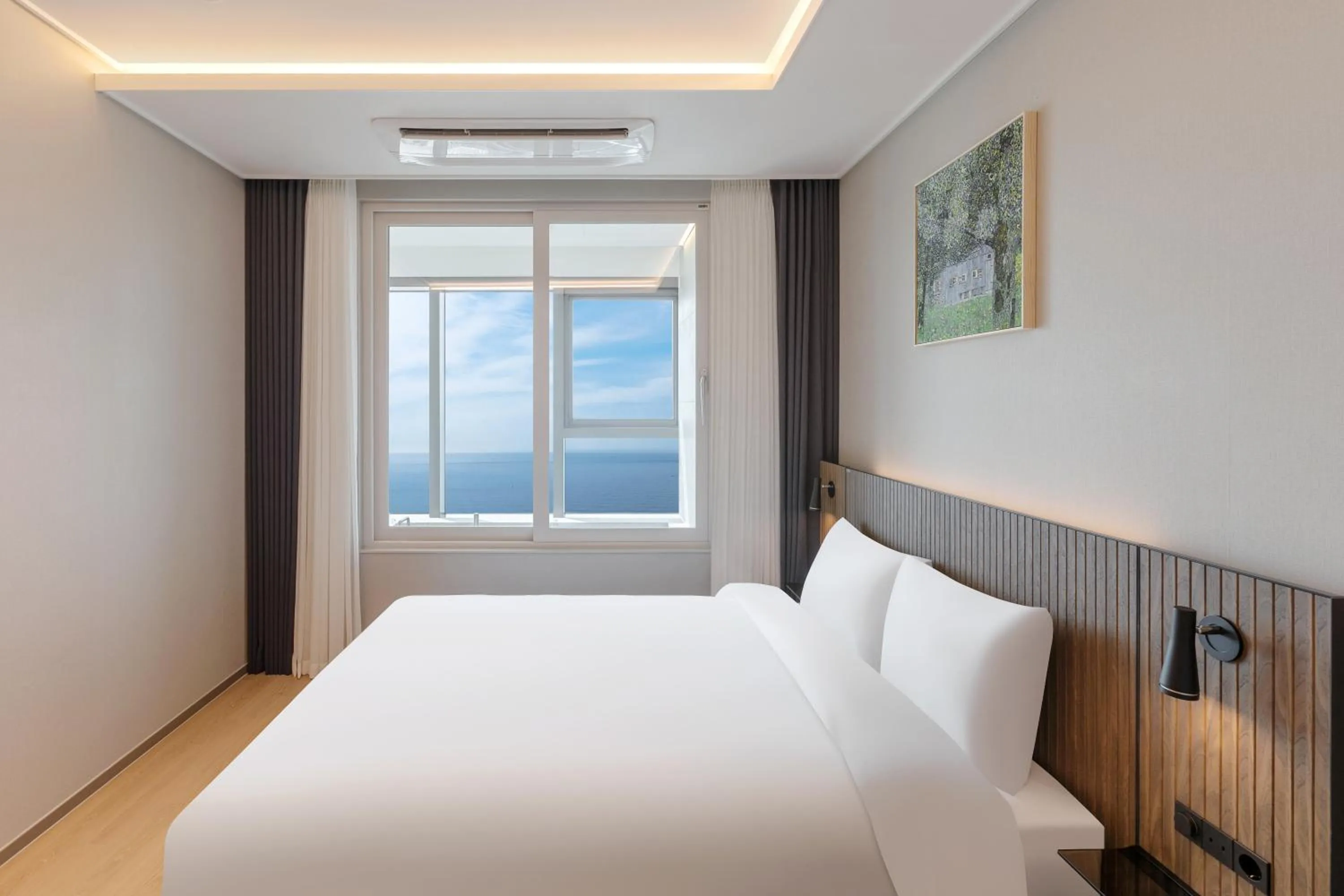 Bedroom, Bed in NewCZ Haeundae Residence