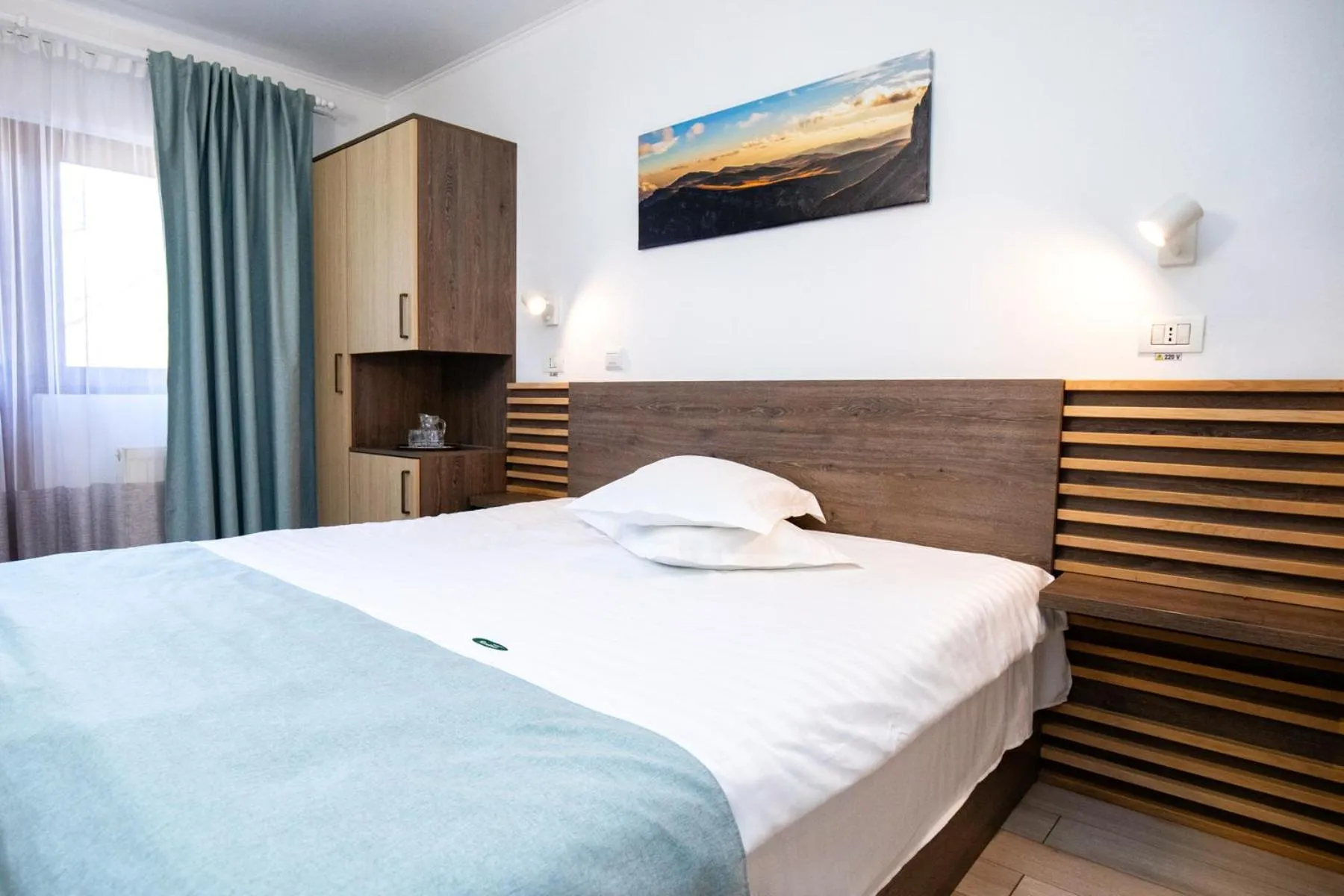 Bed in Hotel Riviera