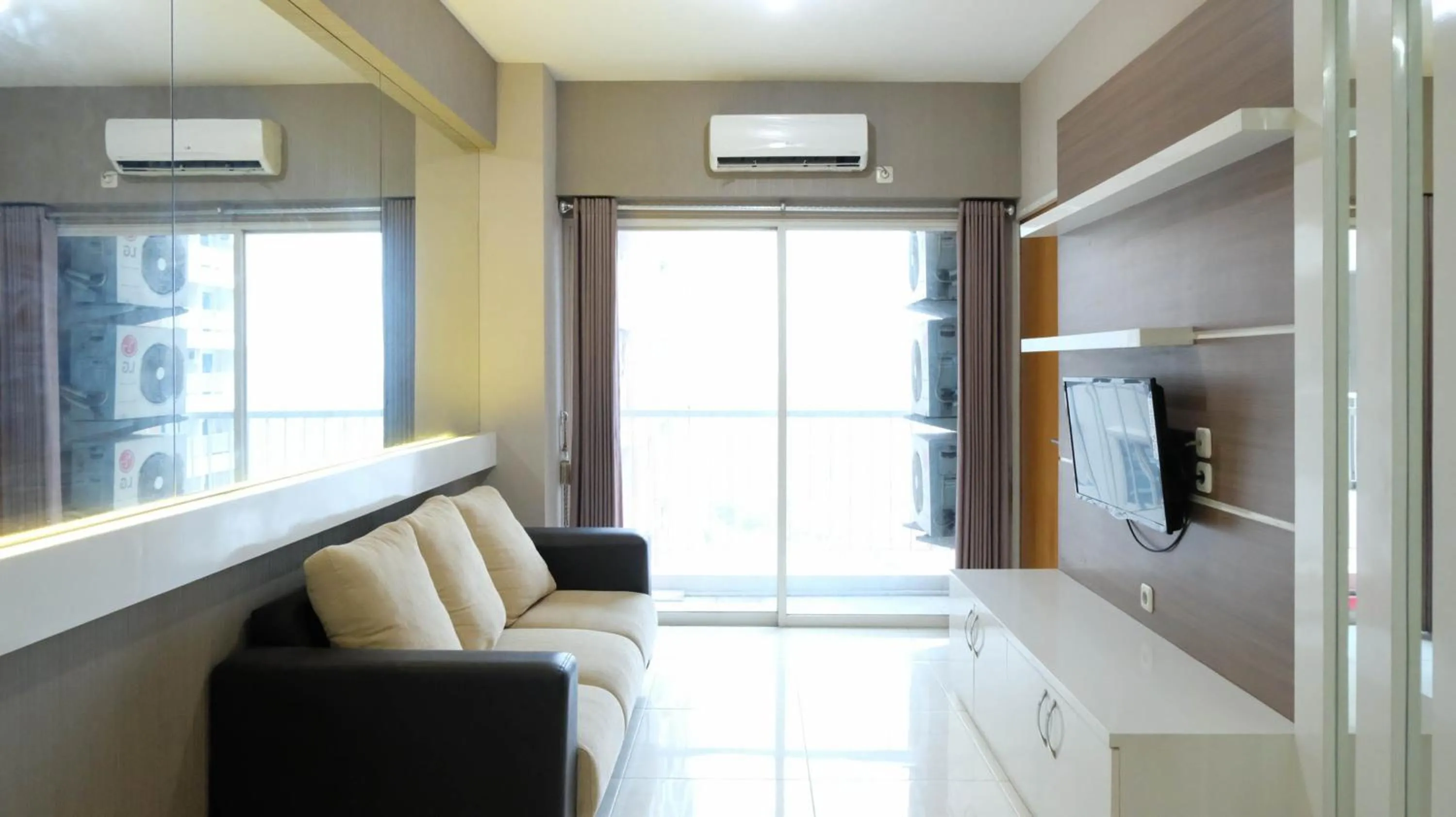 Two-Bedroom Apartment in Homey 2BR at Puncak Bukit Golf Surabaya Apartment By Travelio