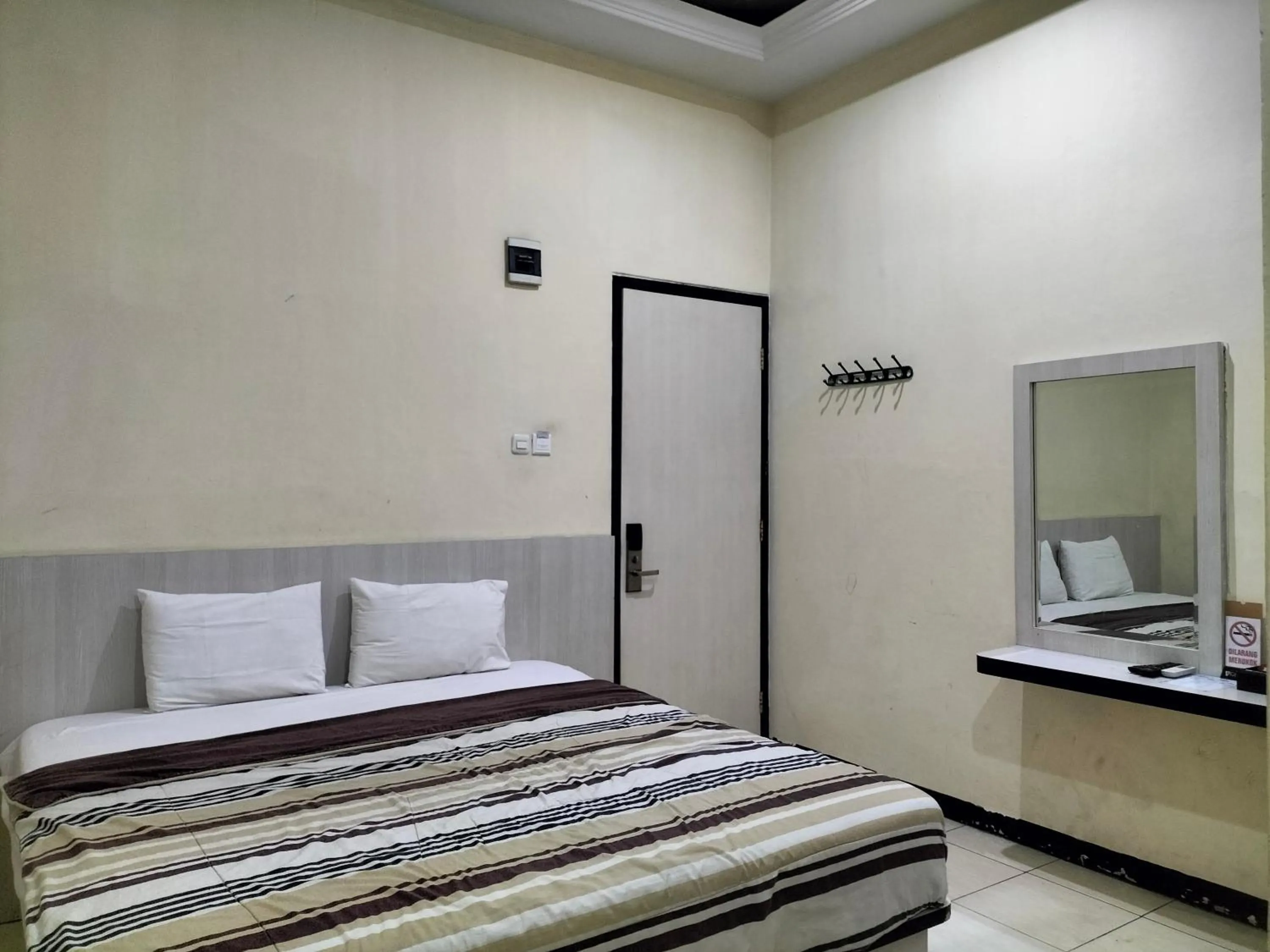 Bed in Hotel Kudus Permata