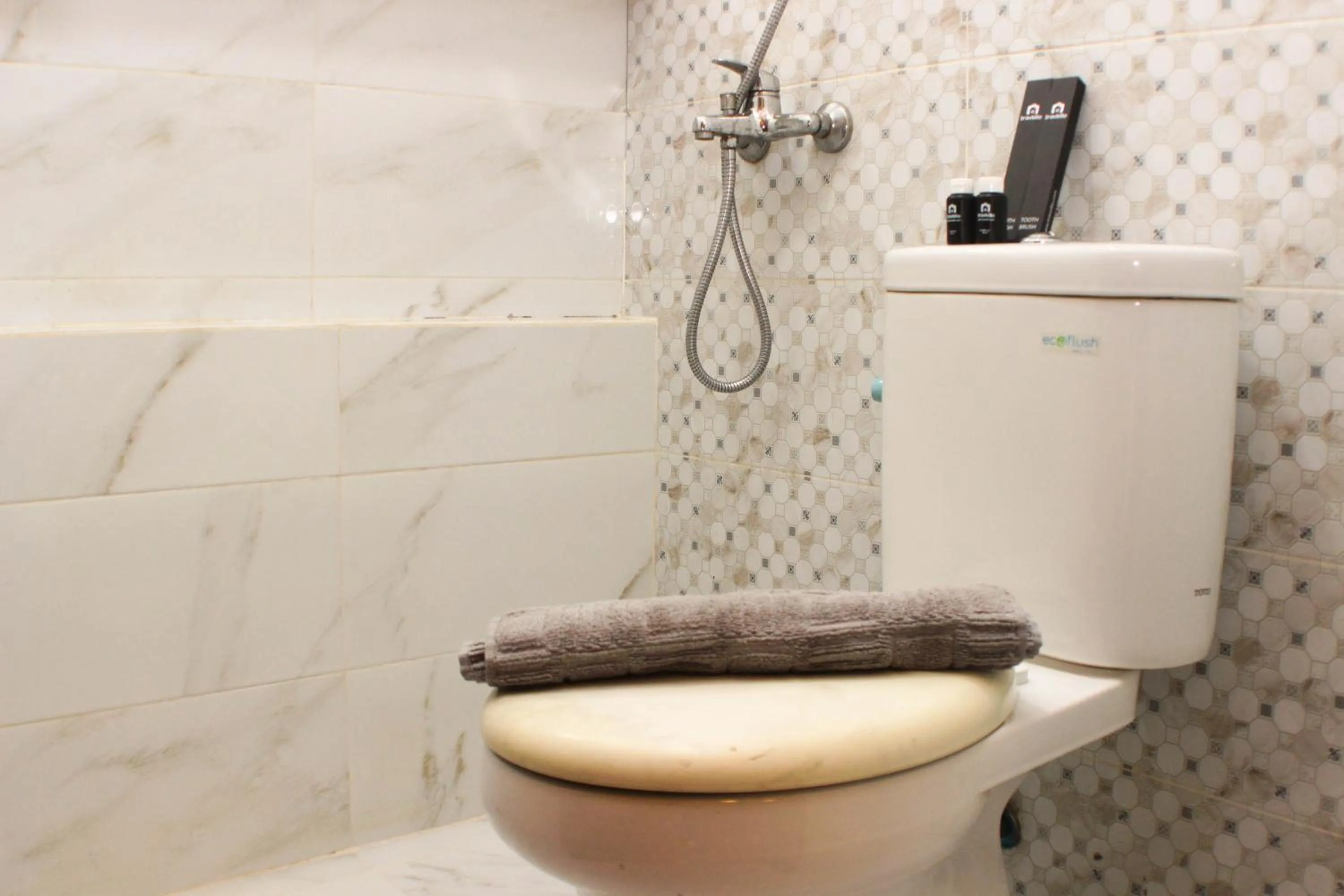 Bathroom in Strategic and Simply 2BR at Bassura City Apartment By Travelio