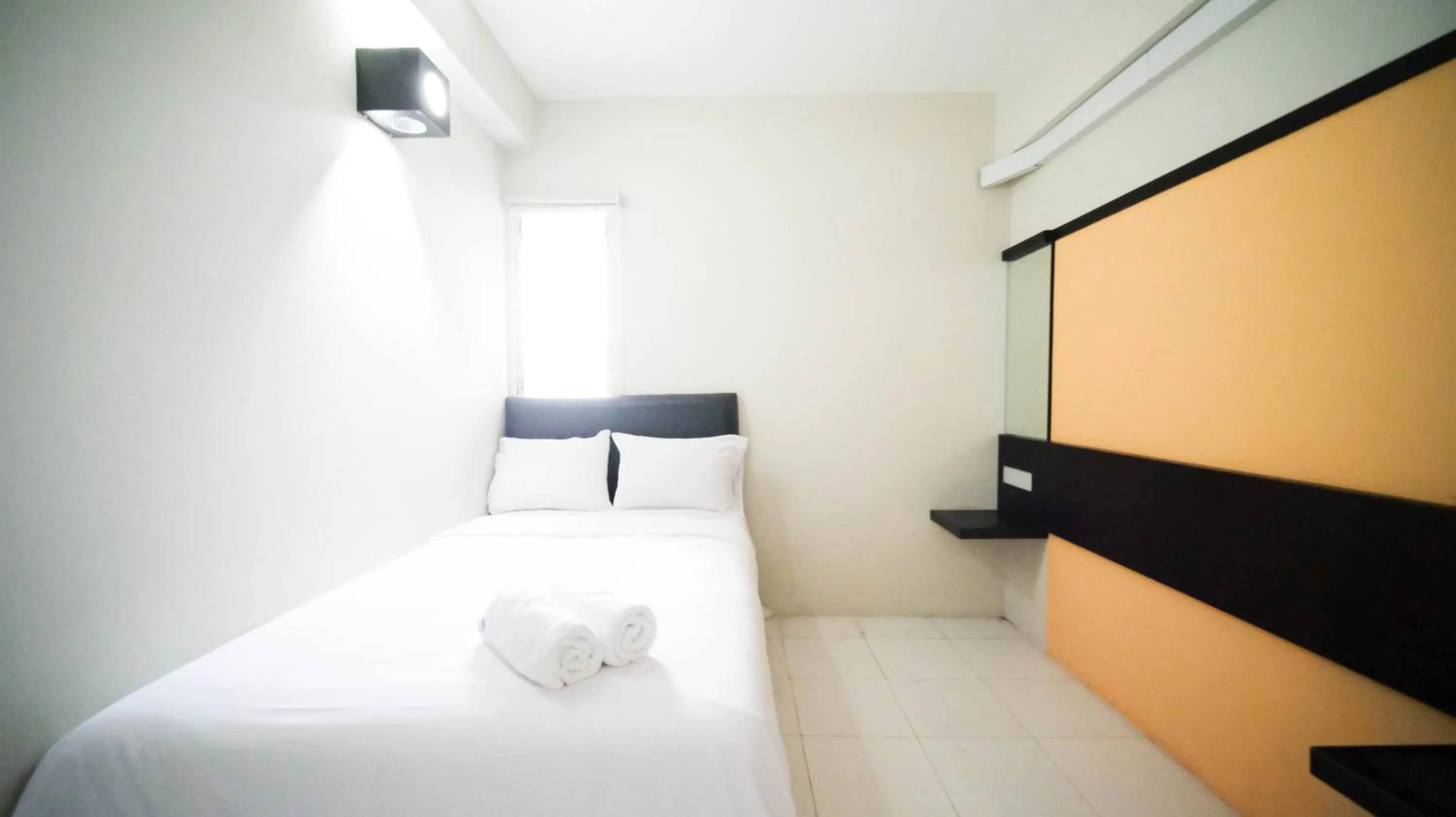 Bedroom, Bed in Homey and Comfy 2BR at Dian Regency Apartment By Travelio